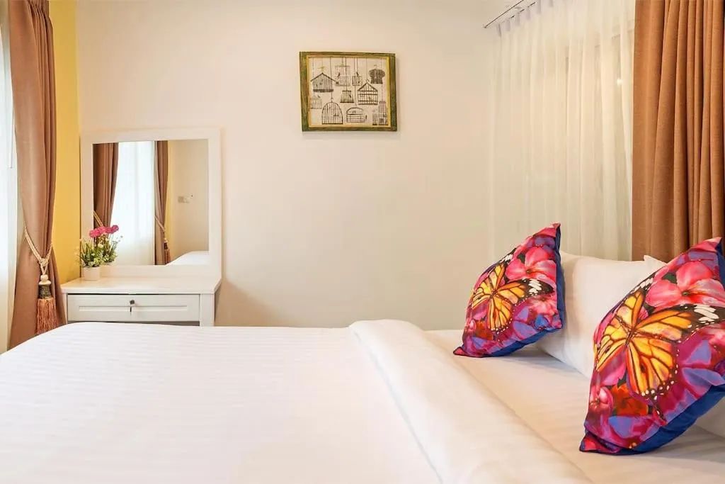 Bed in Aonang Sweet Pool Villa