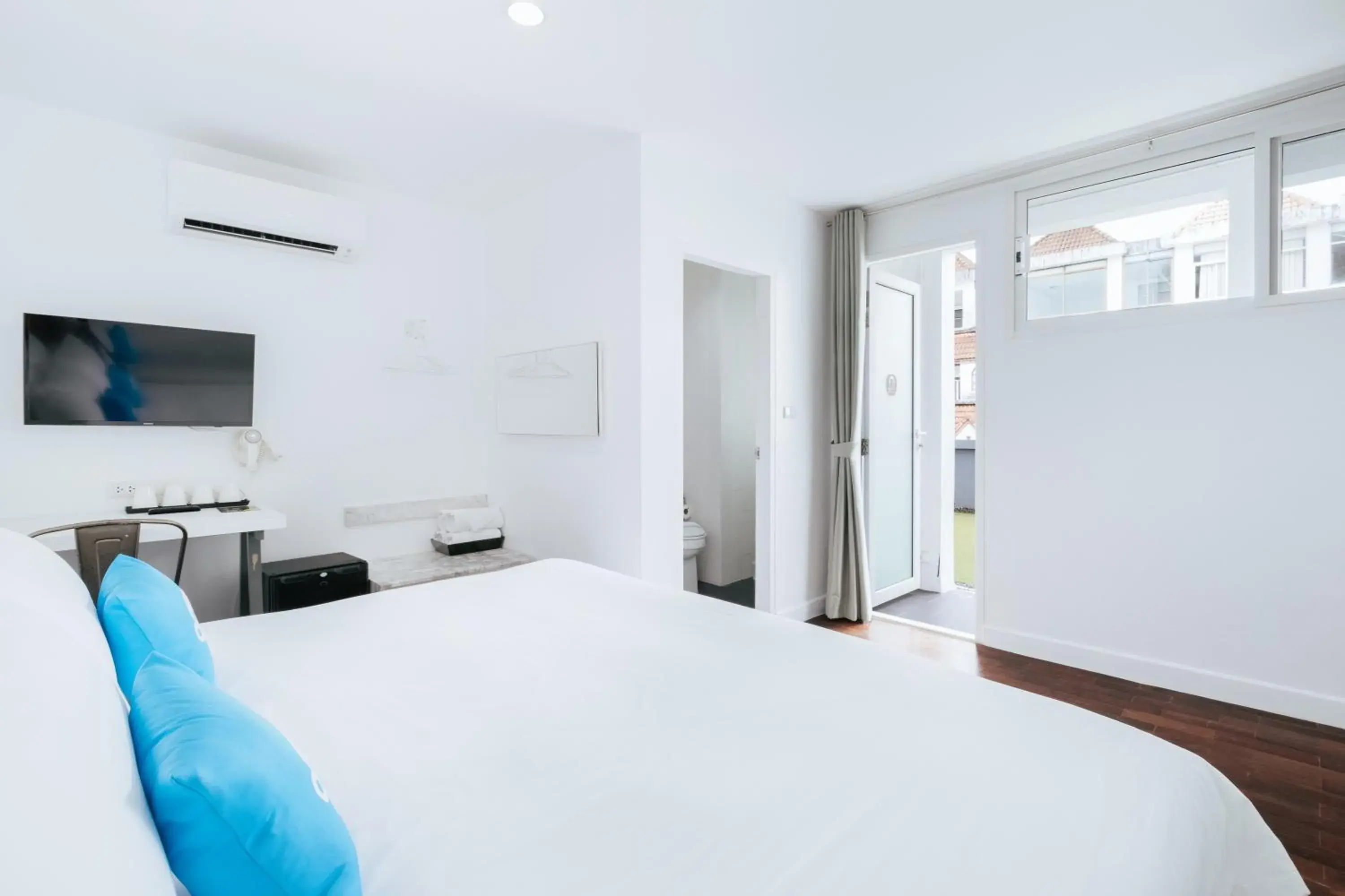 Bed in Blu Monkey Bed & Breakfast Phuket Bed in Blu Monkey Bed & Breakfast Phuket
