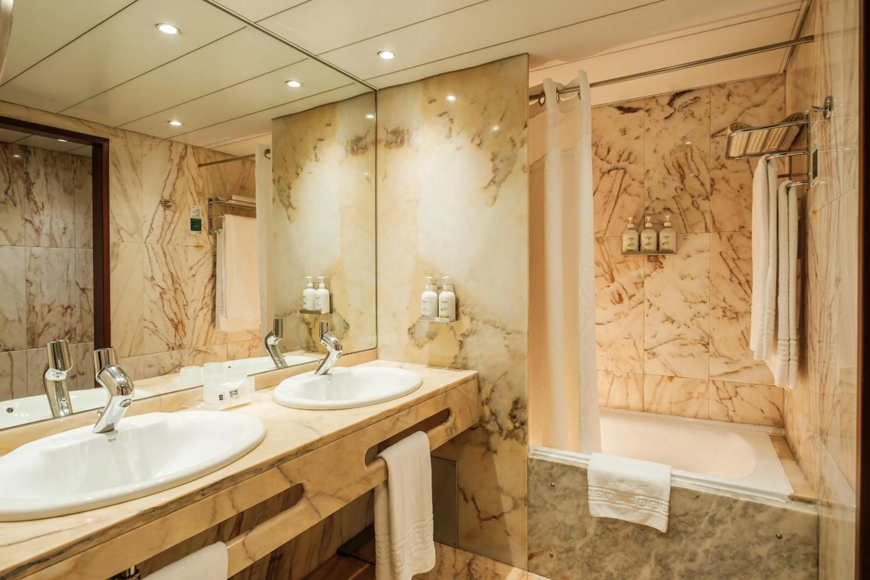 Shower in Holiday Inn Lisbon-Continental by IHG