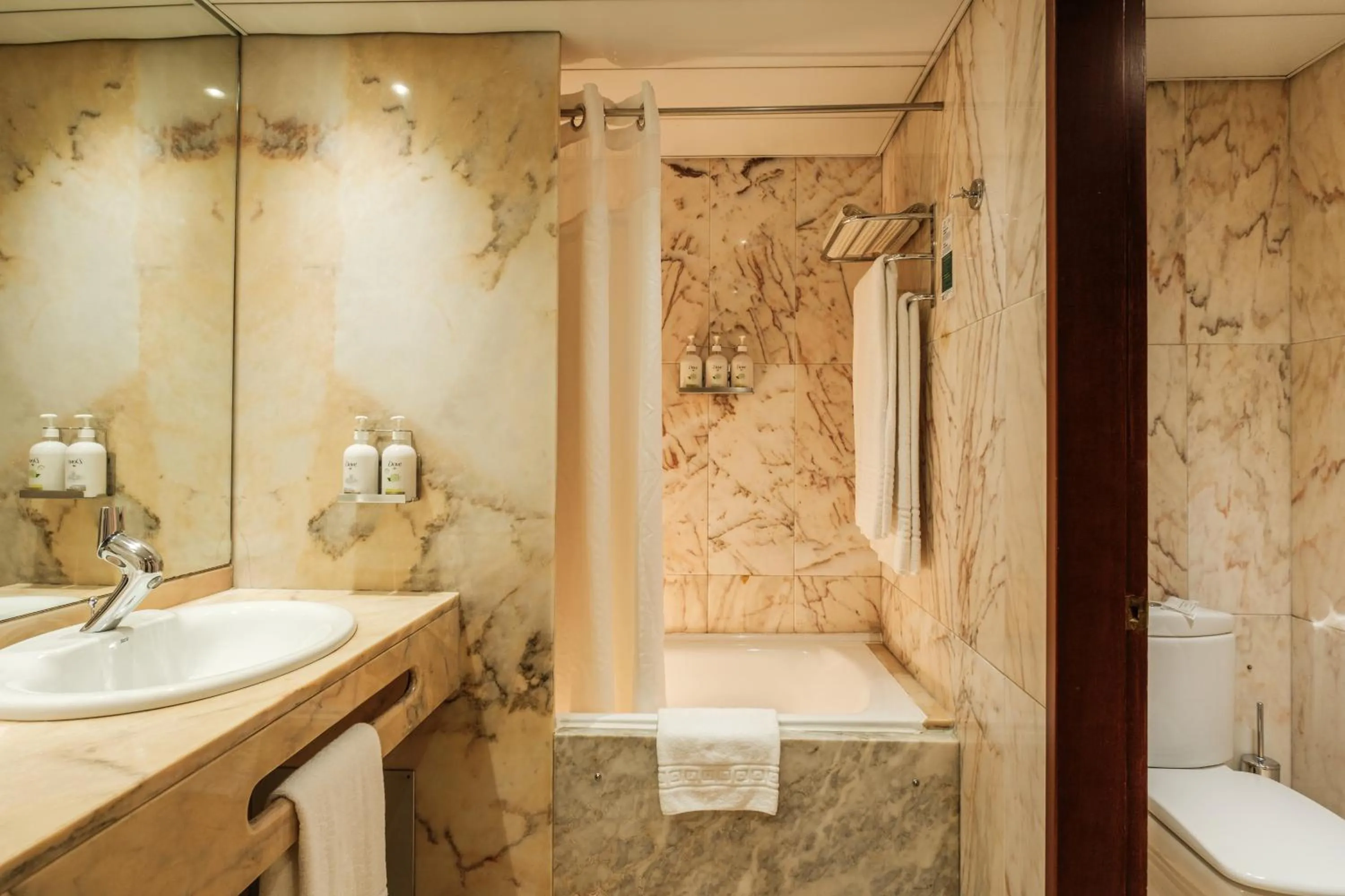 Toilet in Holiday Inn Lisbon-Continental by IHG