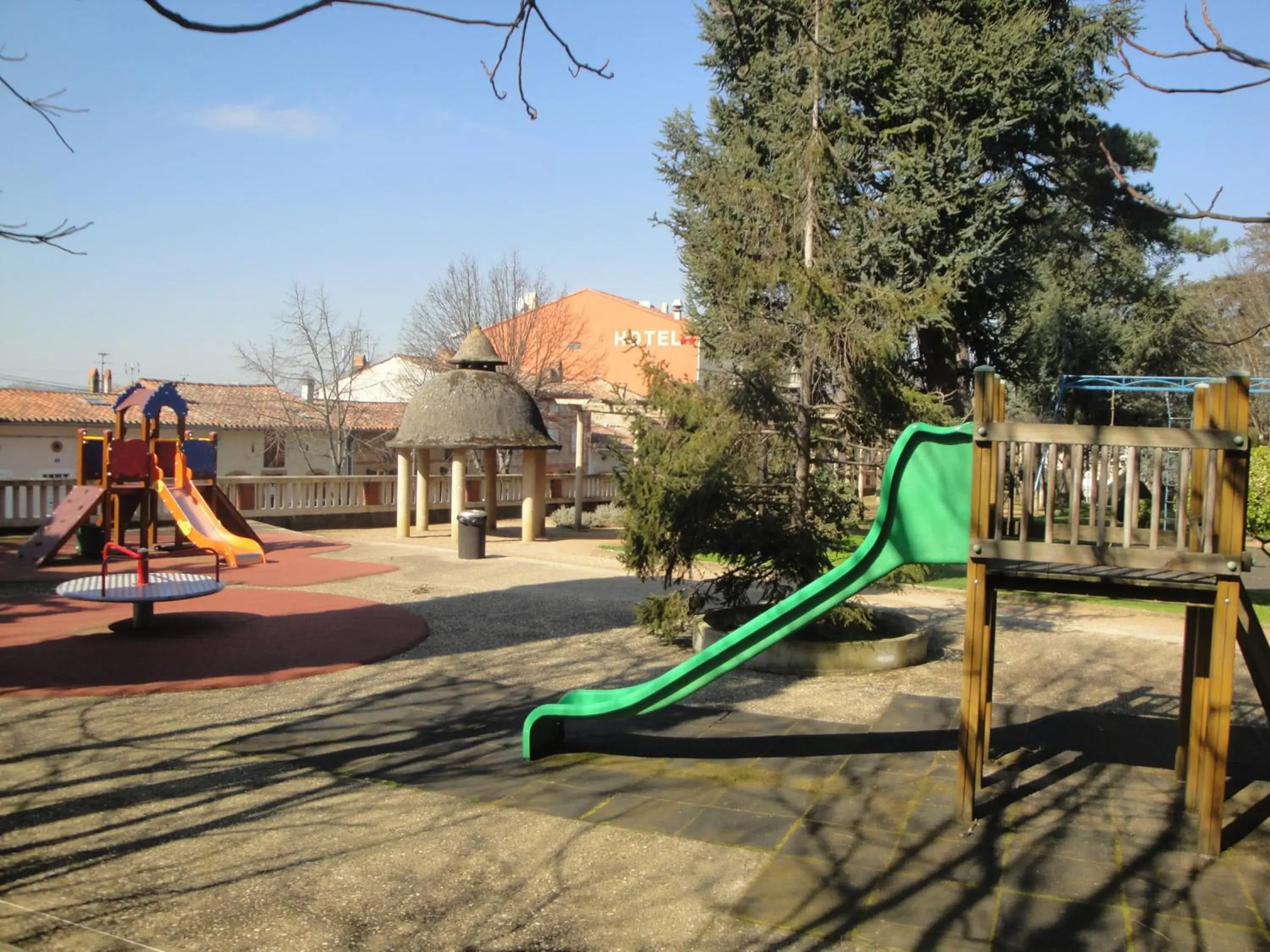 Children play ground, Children's Play Area in Hôtel Restaurant du Lauragais LOGIS DE FRANCE