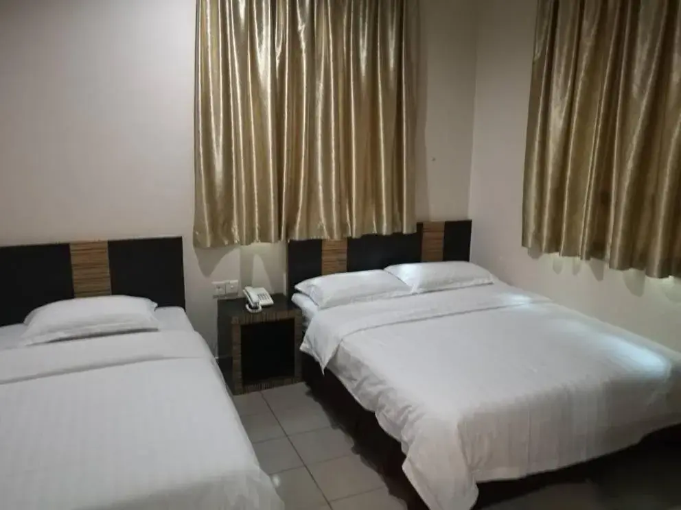 Family Room (3 Adults) in Hotel Traveller Family Room (3 Adults) in Hotel Traveller