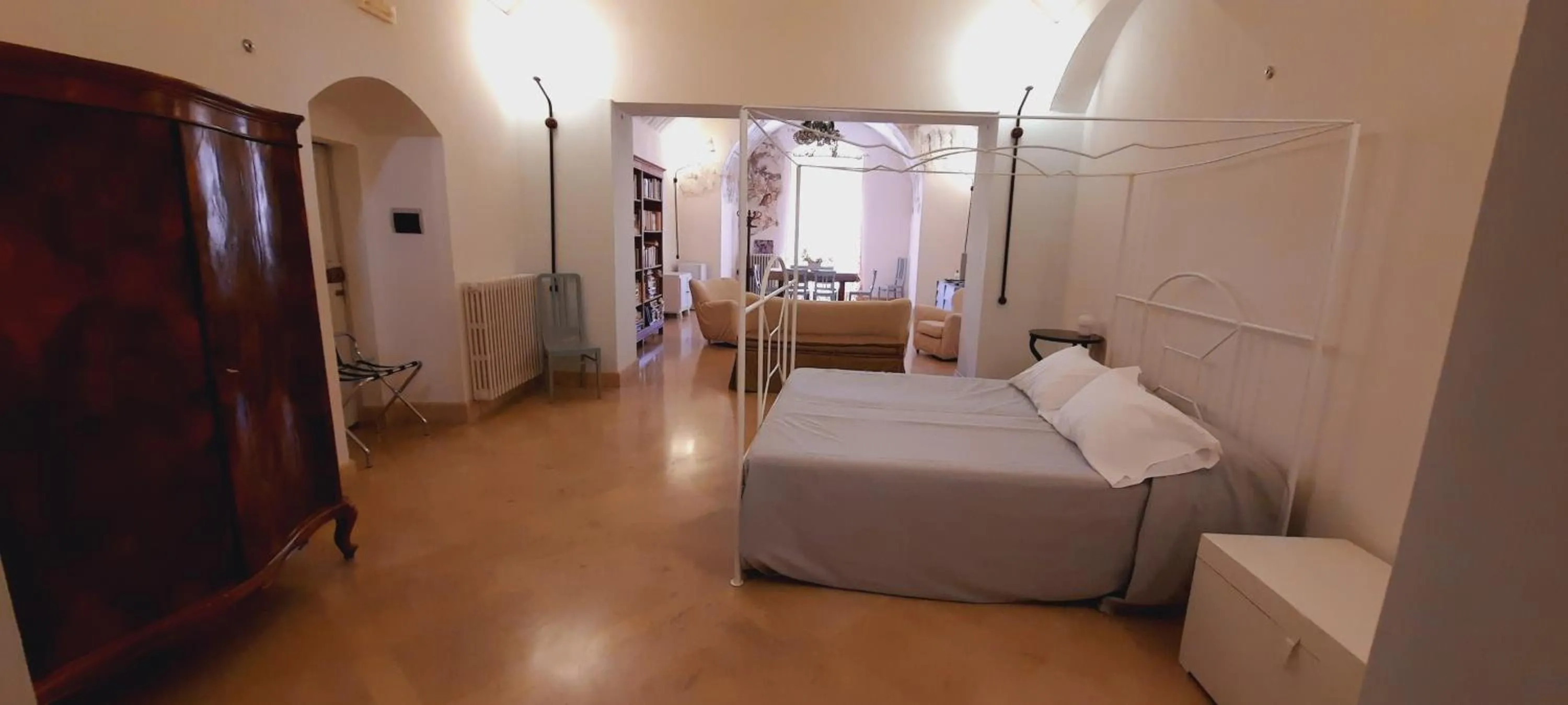 Living room, Bed in Palazzo Bernardini B & B