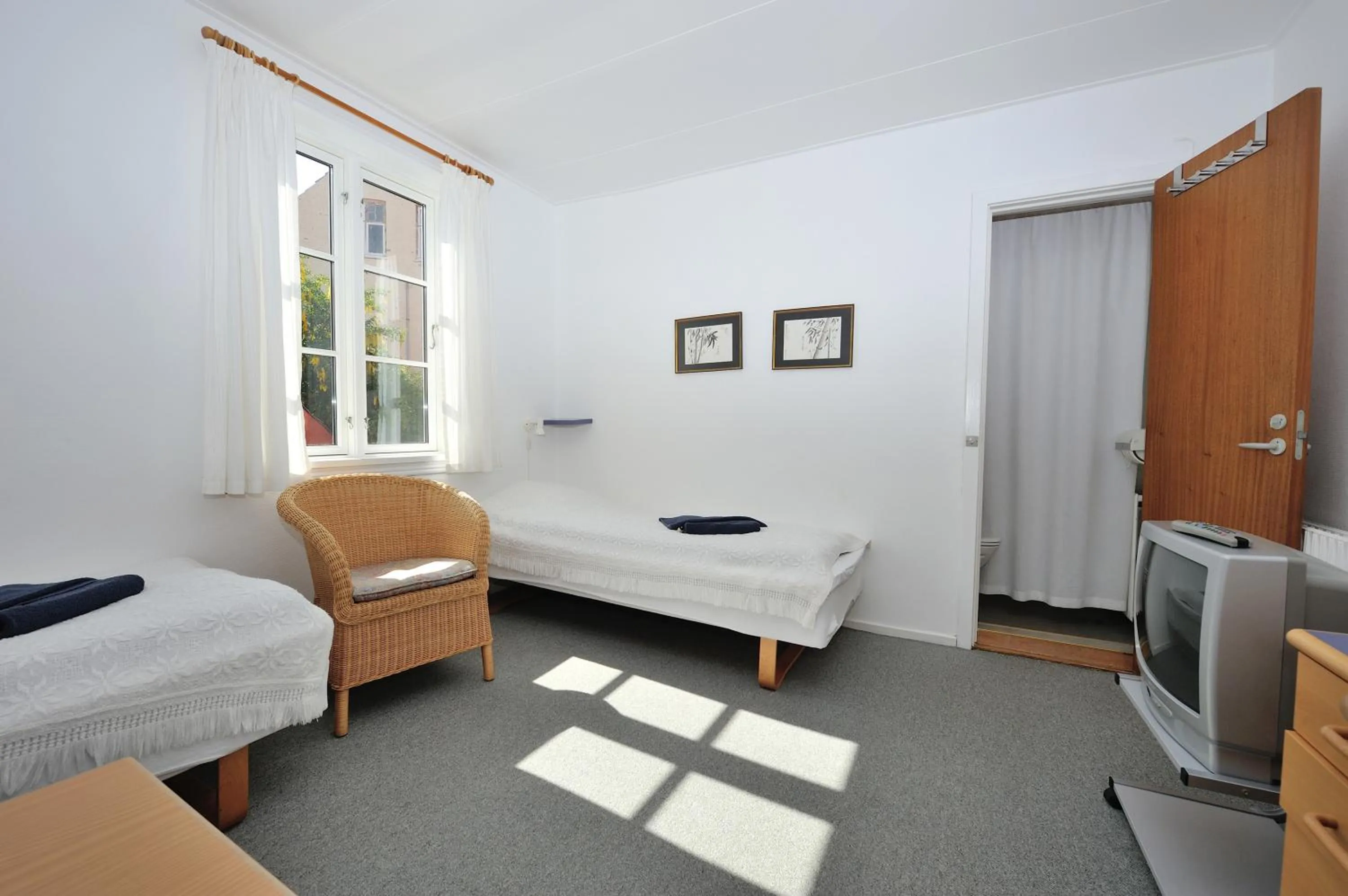 Bed in Hotel Gudhjem