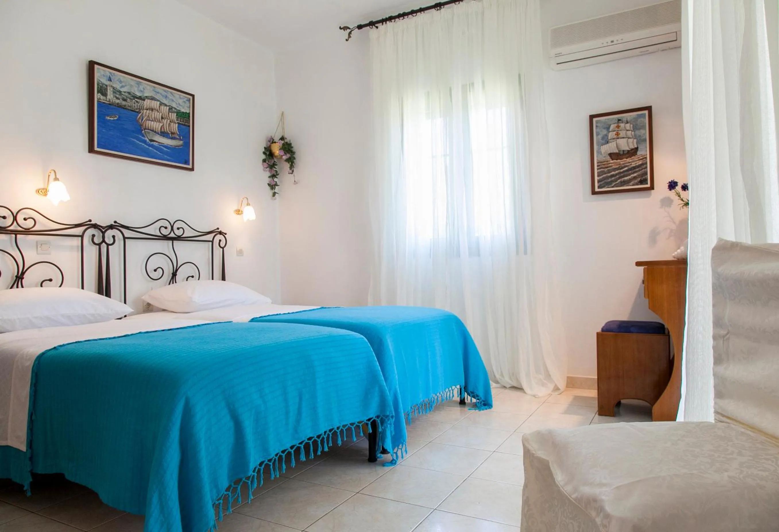 Bed in Monambeles Villas