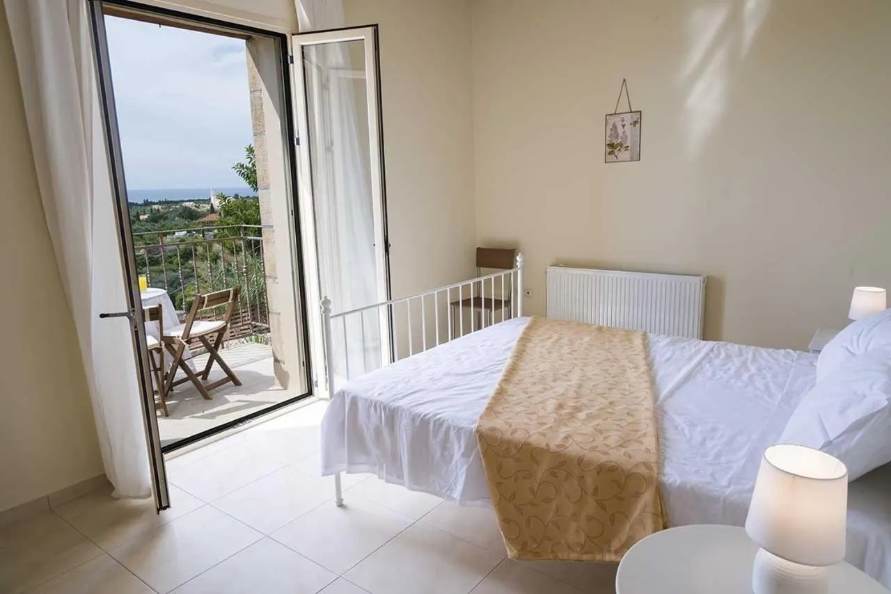 Bed in Monambeles Villas