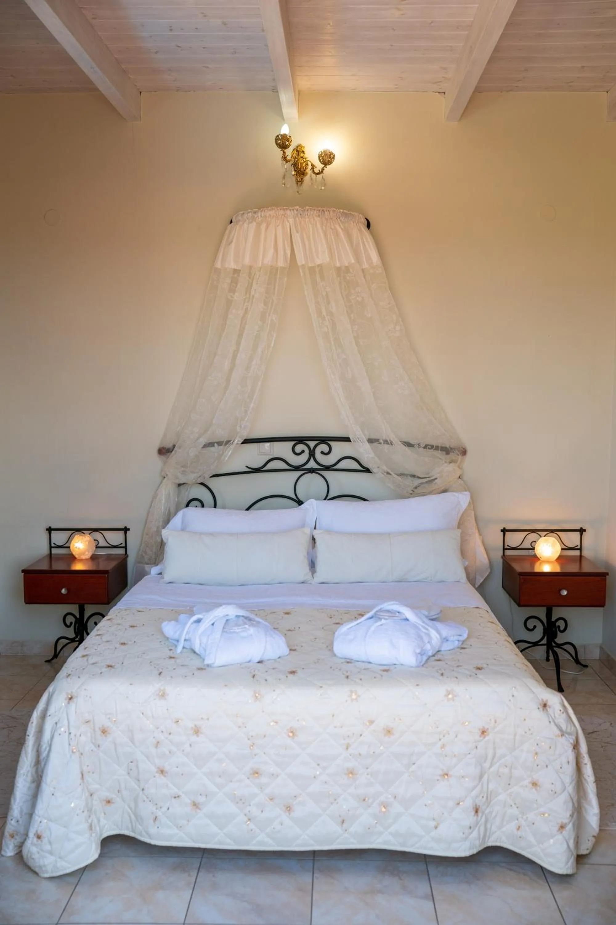 Bed in Monambeles Villas