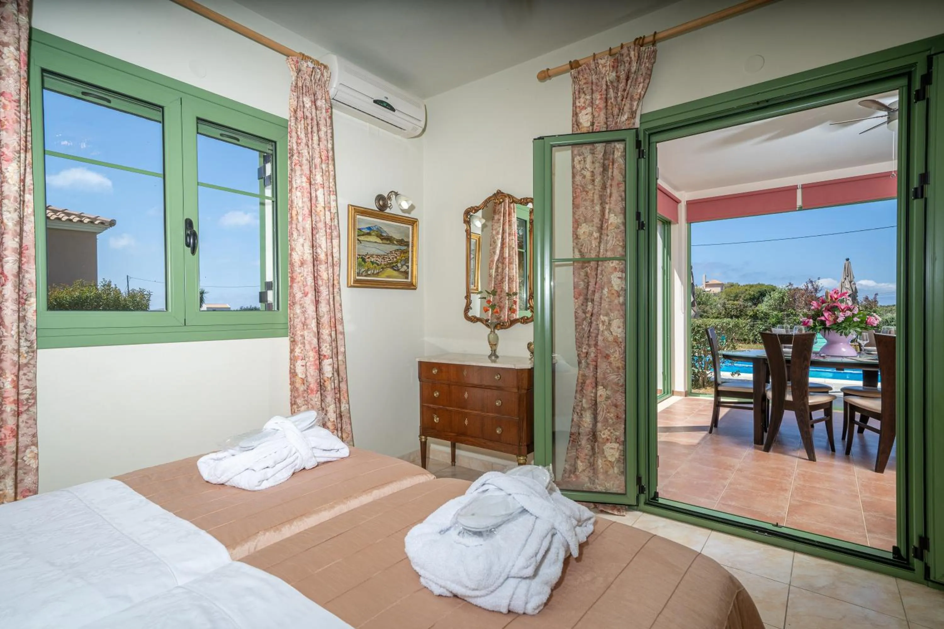 Bed in Monambeles Villas