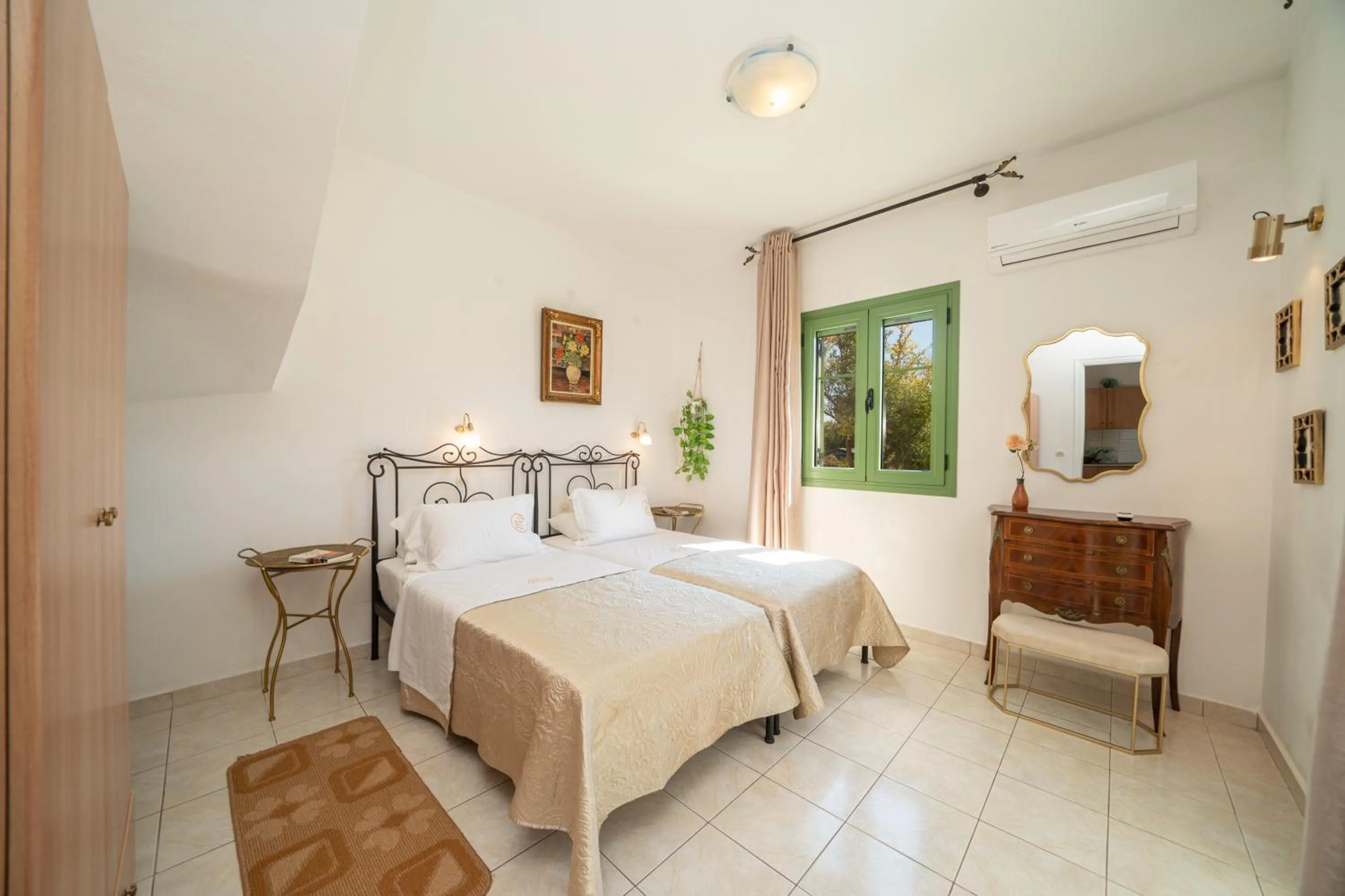 Bed in Monambeles Villas