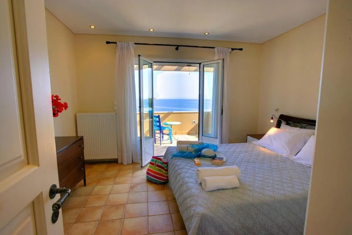 Bed in Monambeles Villas