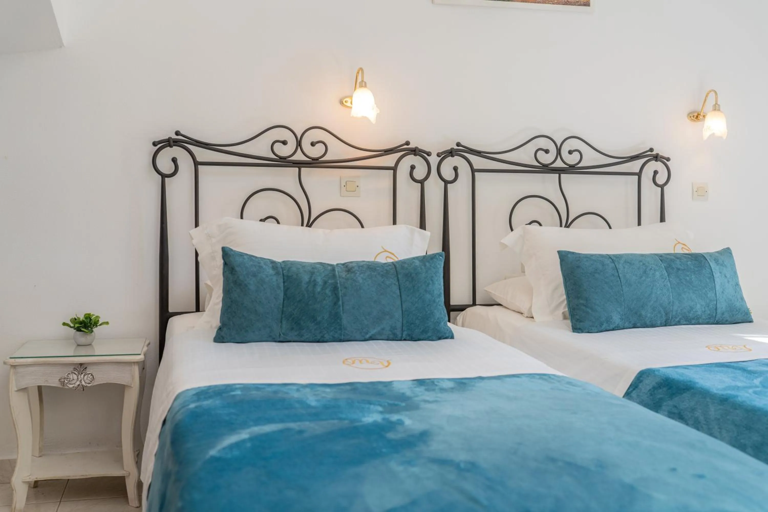 Bed in Monambeles Villas