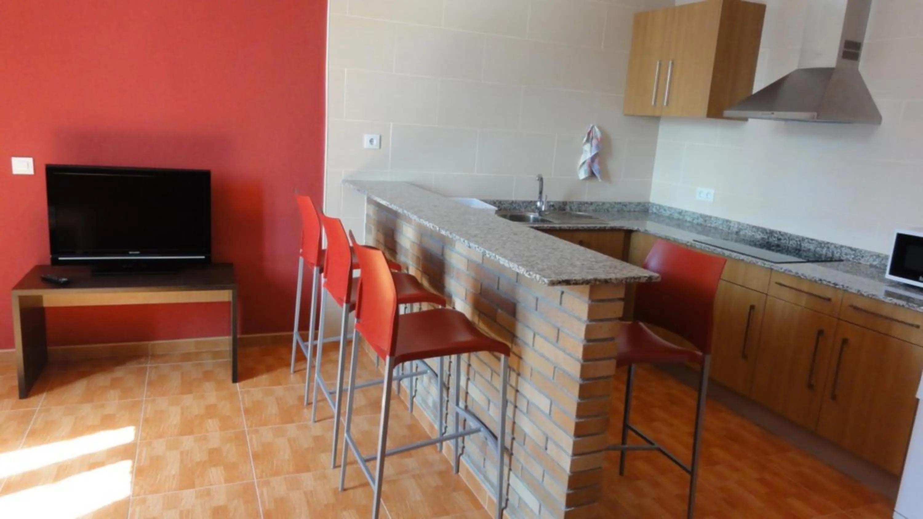 Kitchen or kitchenette in Aparthotel Can Gallart