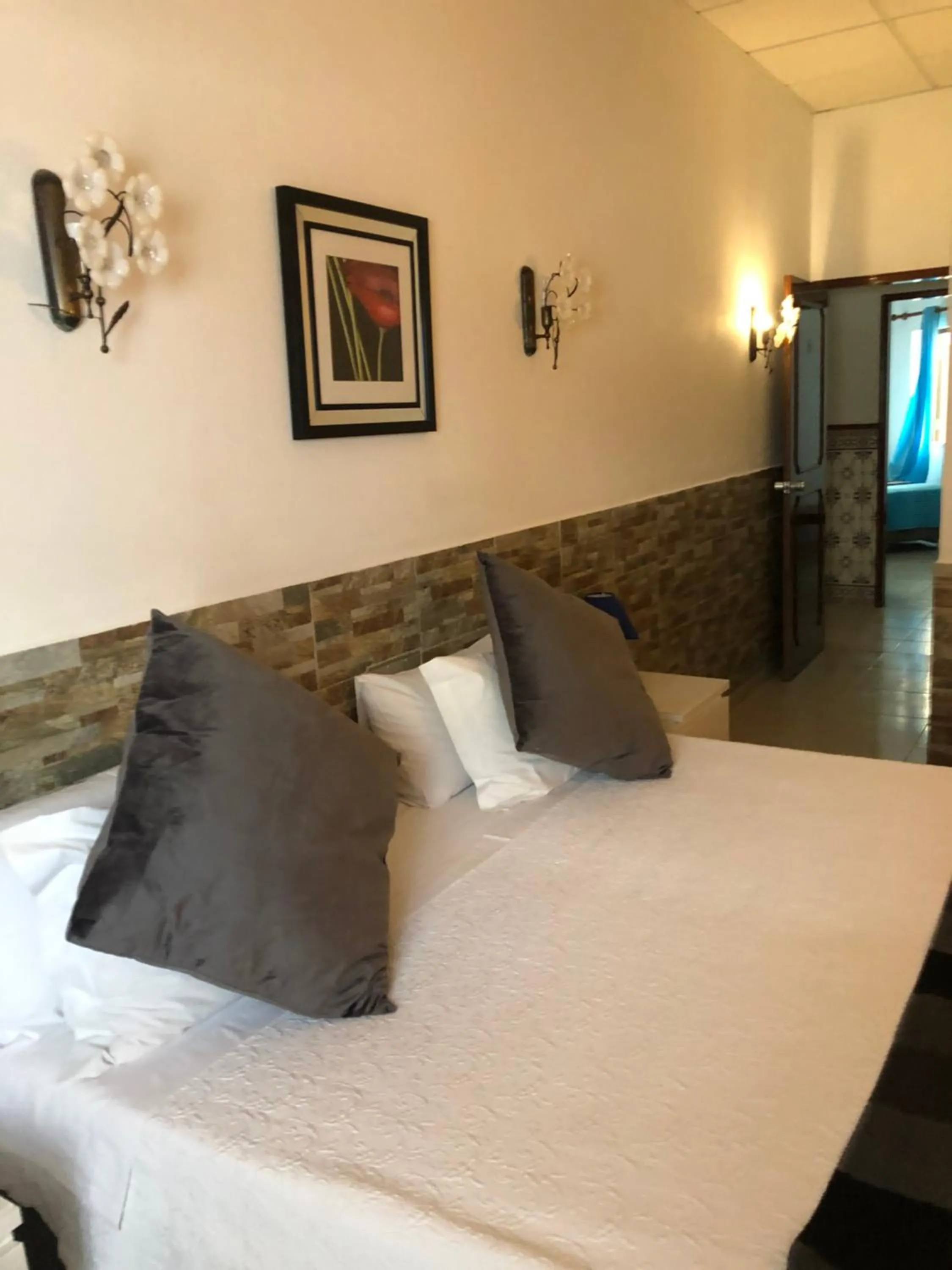 Bed in Apartamentos e Quartos Atalaia