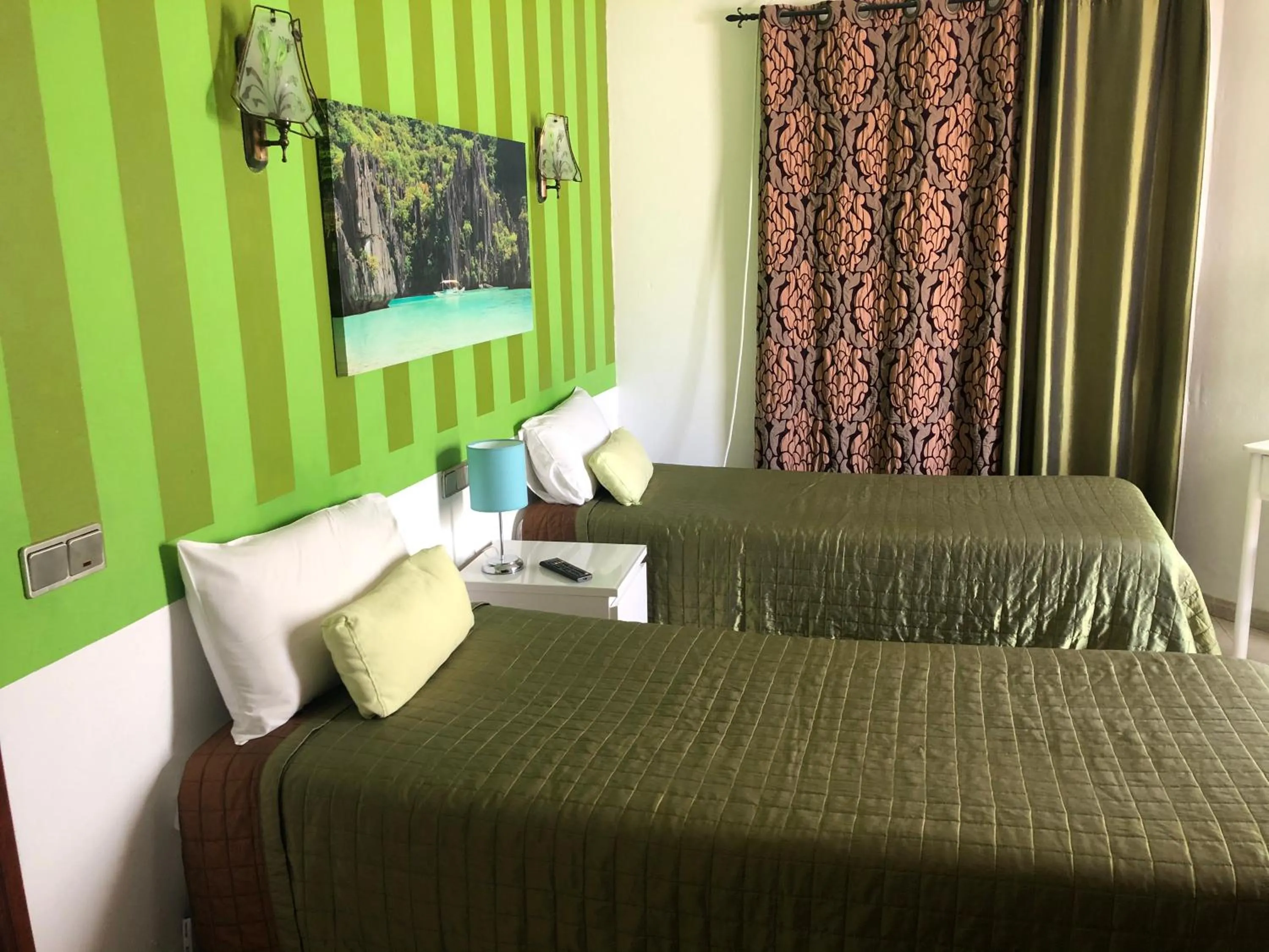 Bed in Apartamentos e Quartos Atalaia