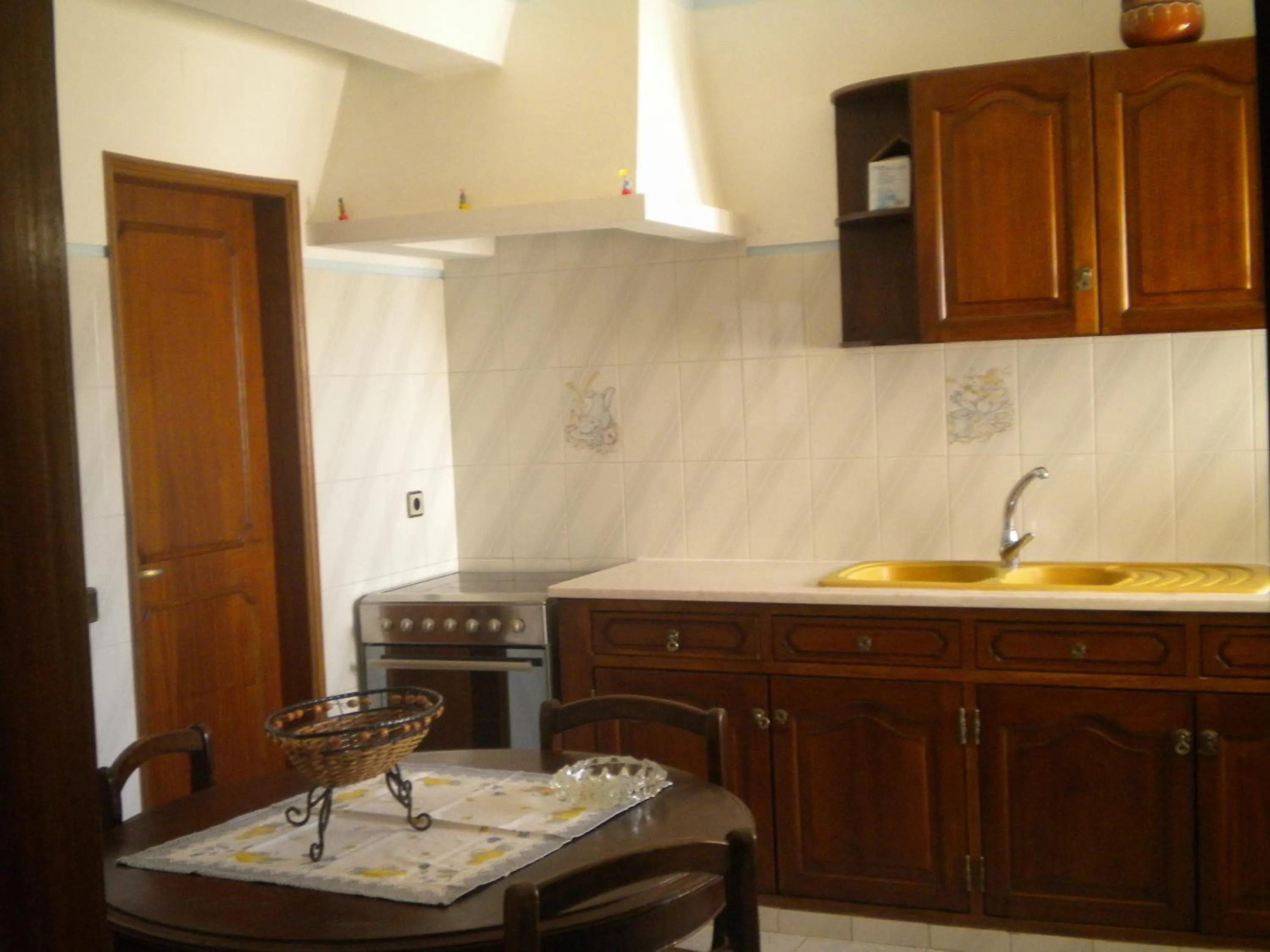 Kitchen or kitchenette in Apartamentos e Quartos Atalaia
