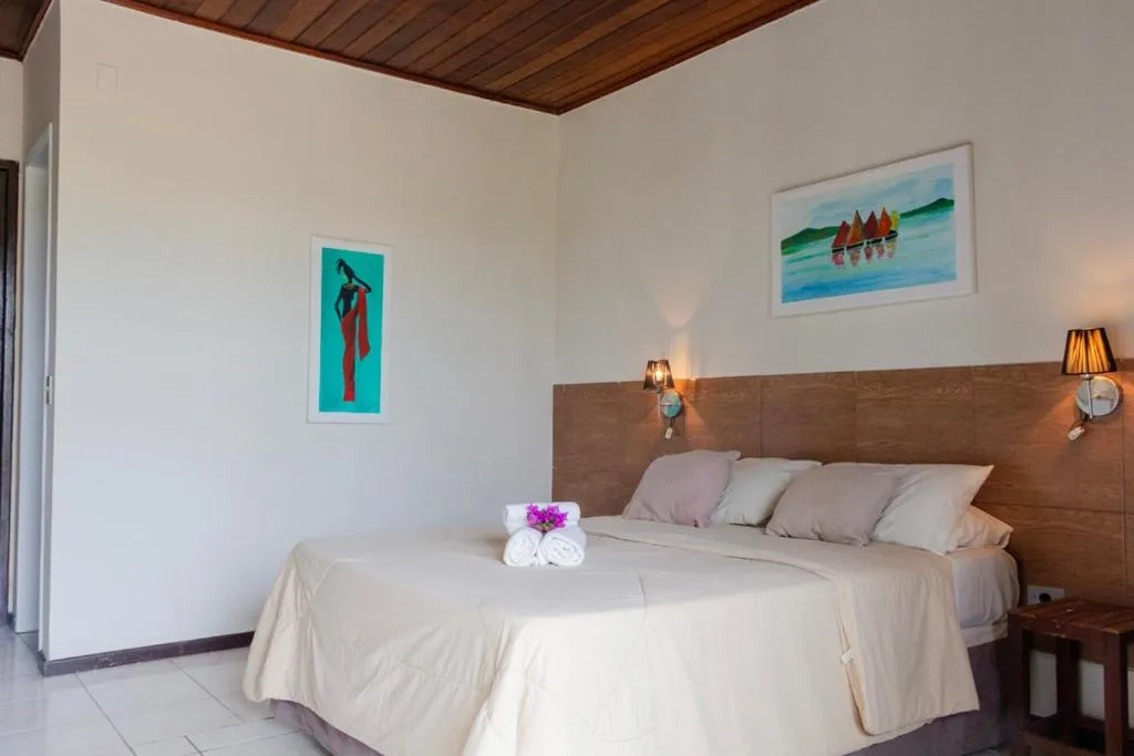 Bed in Pousada New Paradise