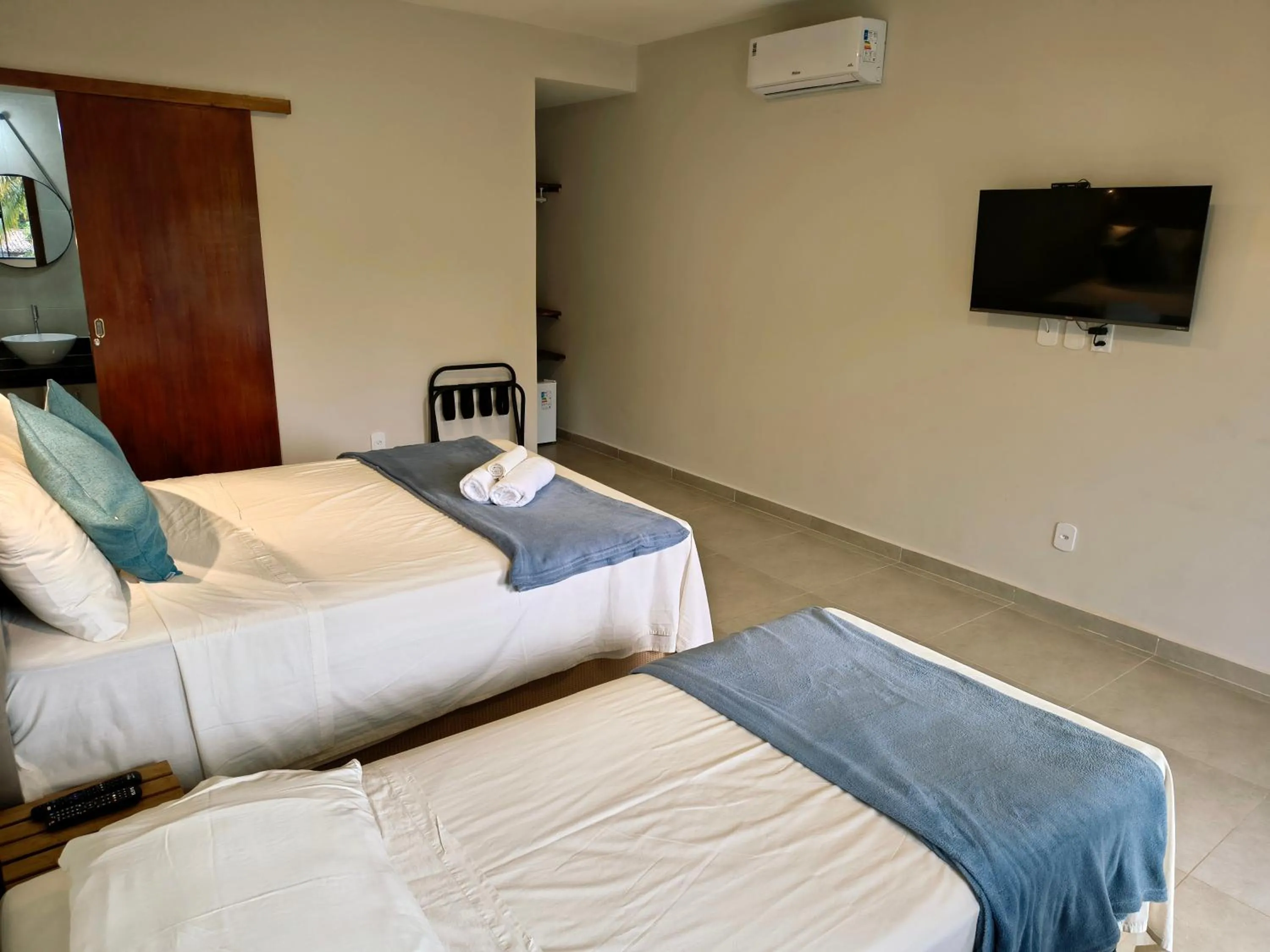 Bed in Pousada New Paradise