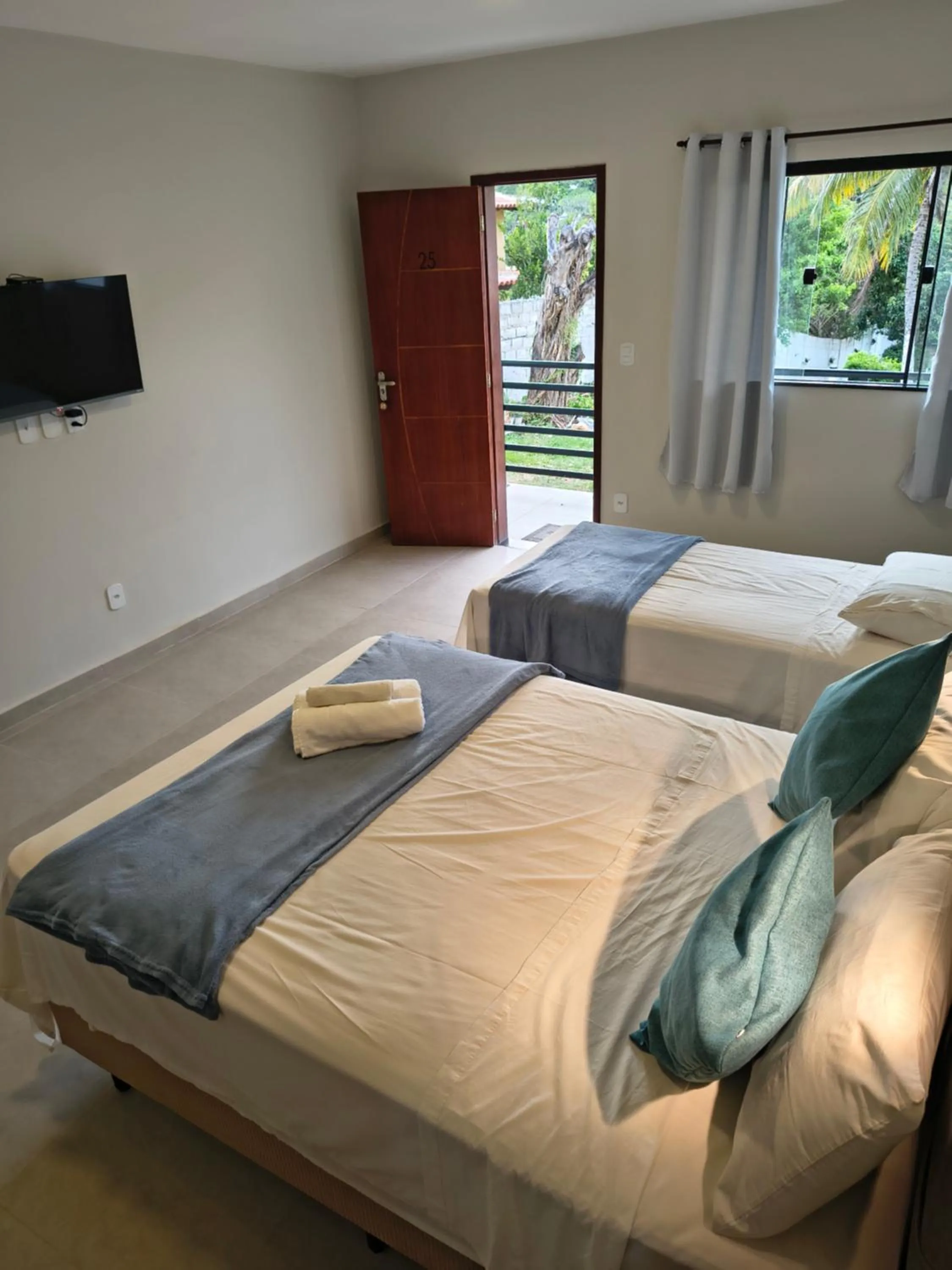 Bed in Pousada New Paradise