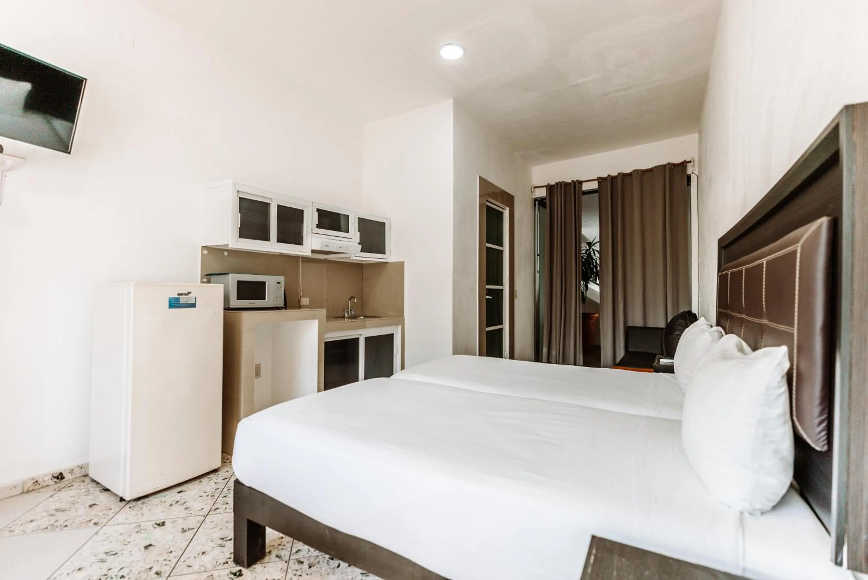 Bed in Loft Hotel Malecón Vallarta