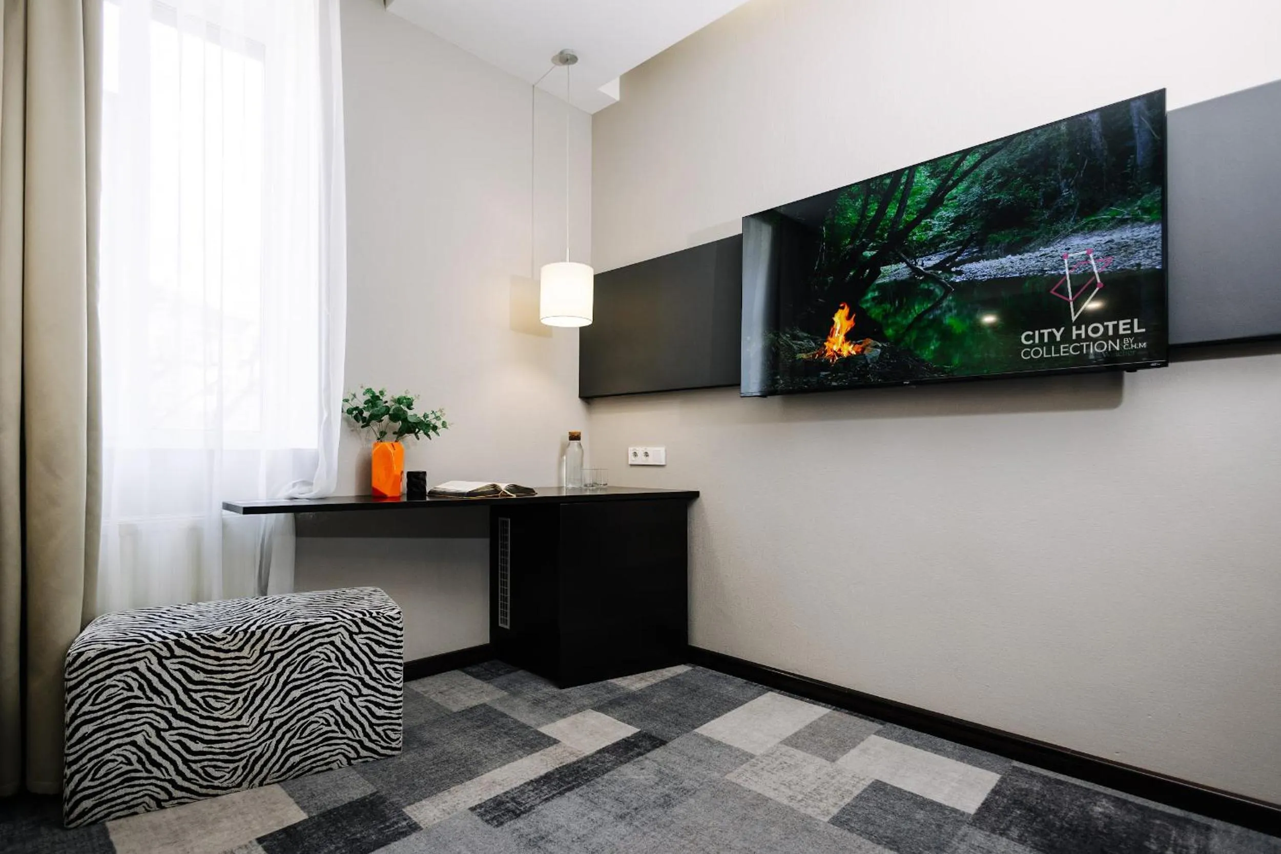 TV and multimedia in City Park Stay by CHM