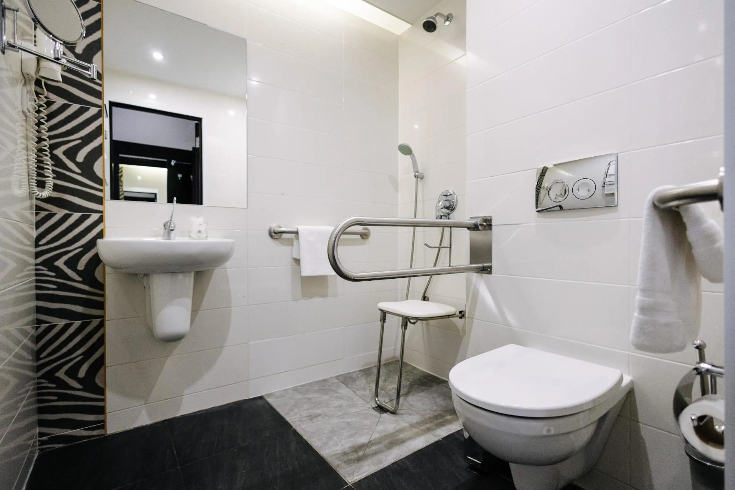 Toilet in City Park Stay by CHM