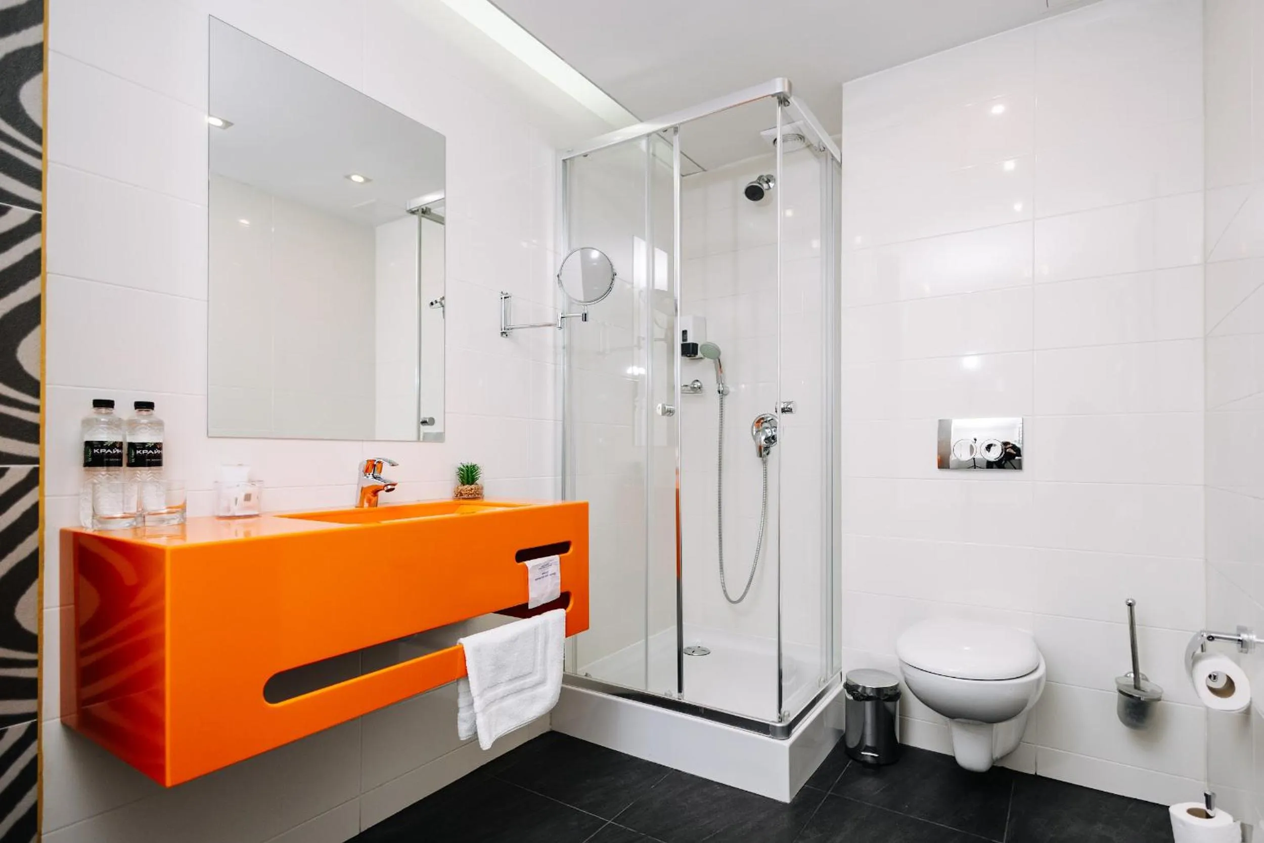 Shower in City Park Stay by CHM