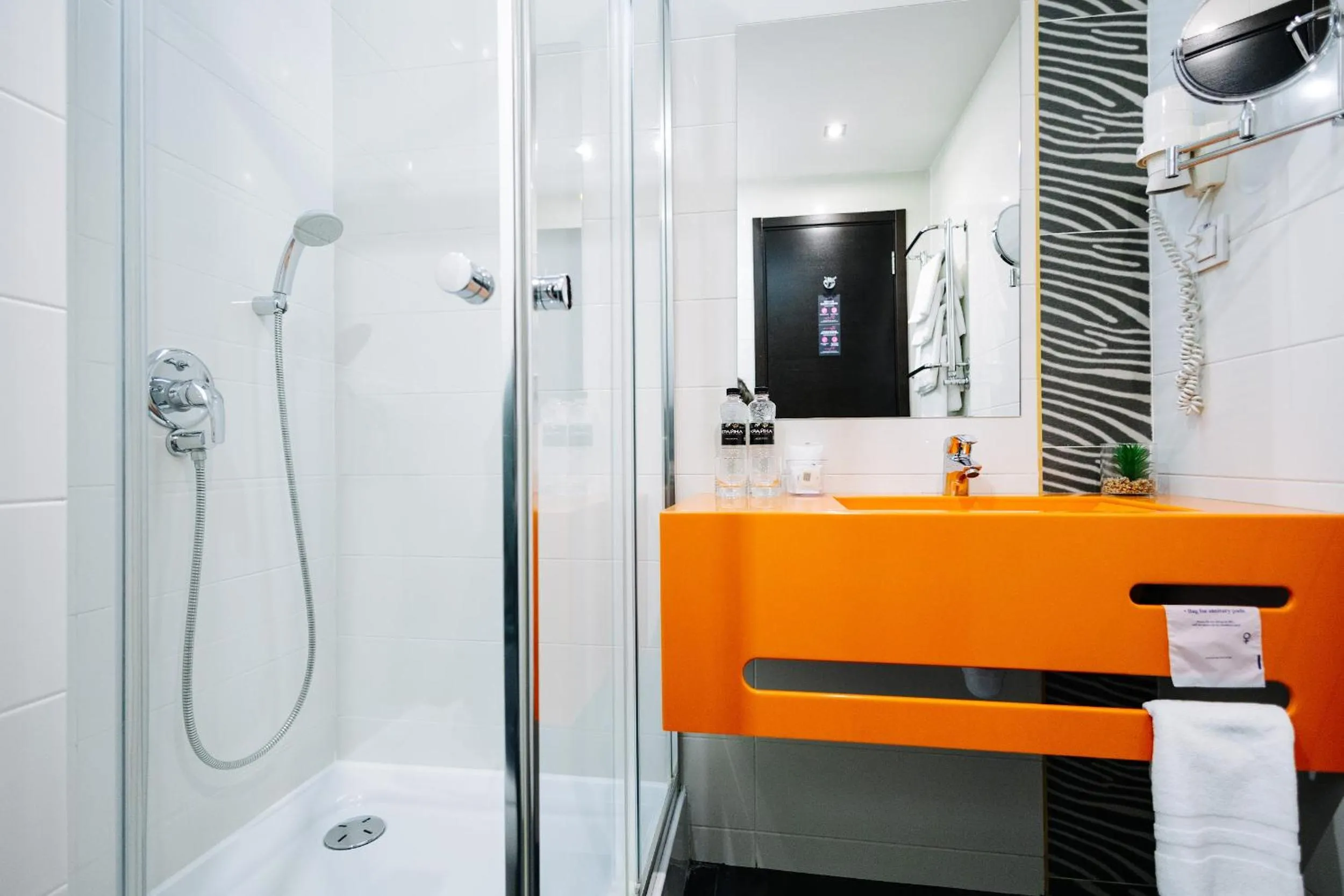 Shower in City Park Stay by CHM