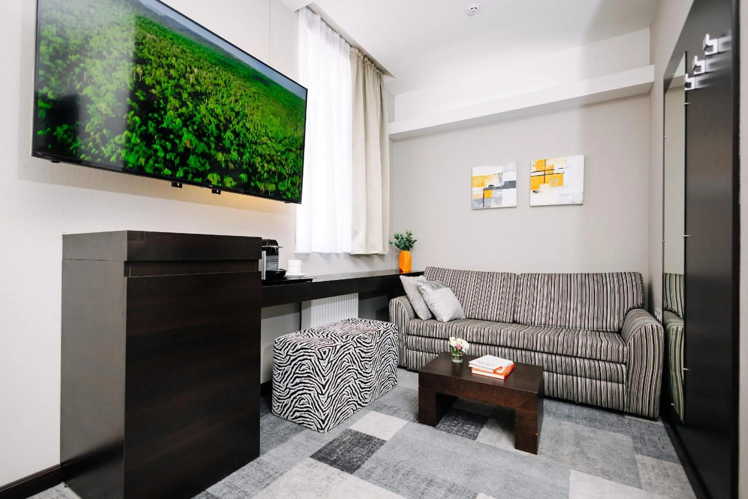 TV and multimedia in City Park Stay by CHM