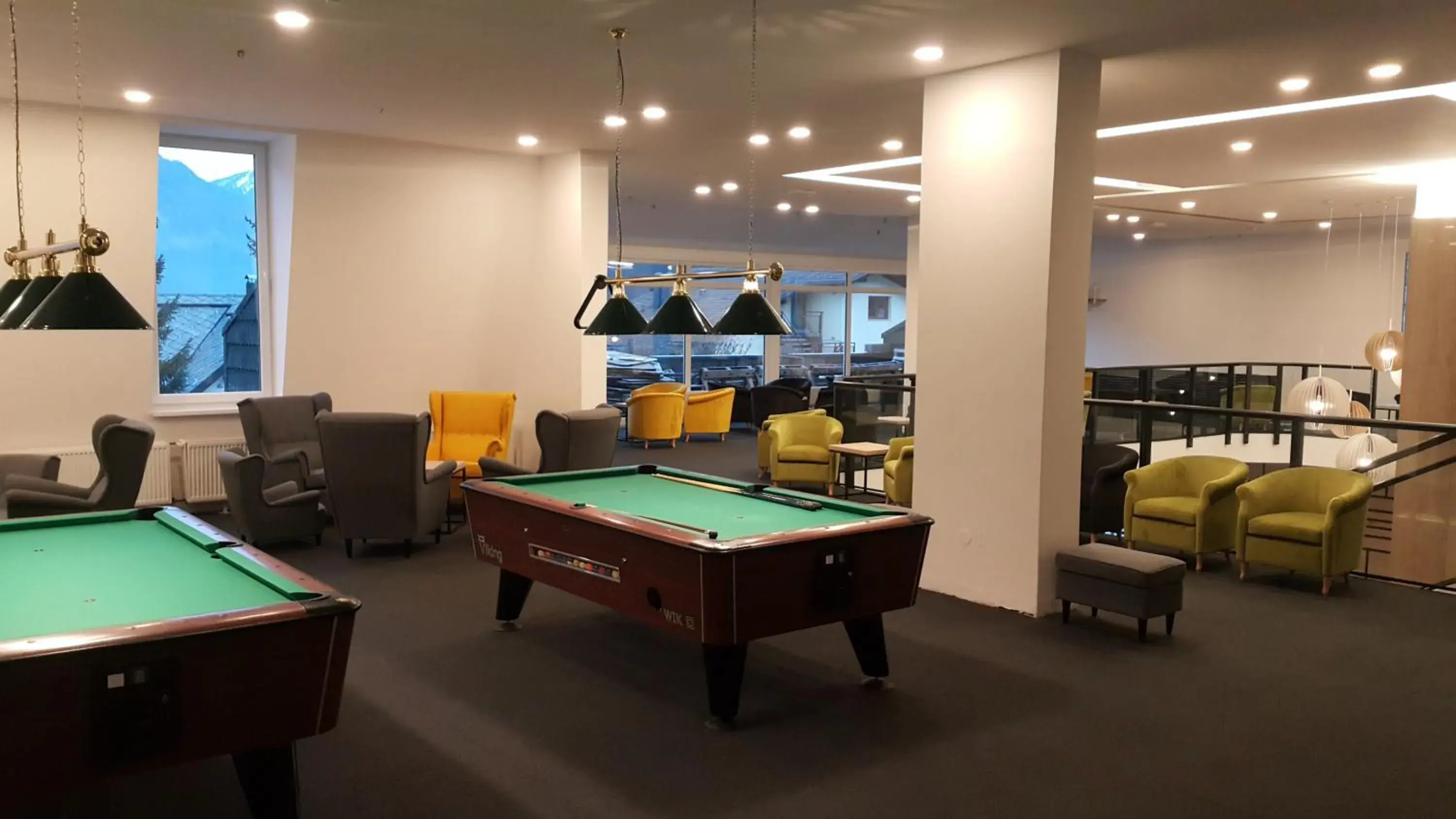 Lobby or reception in Hotel Alpina Lobby or reception in Hotel Alpina