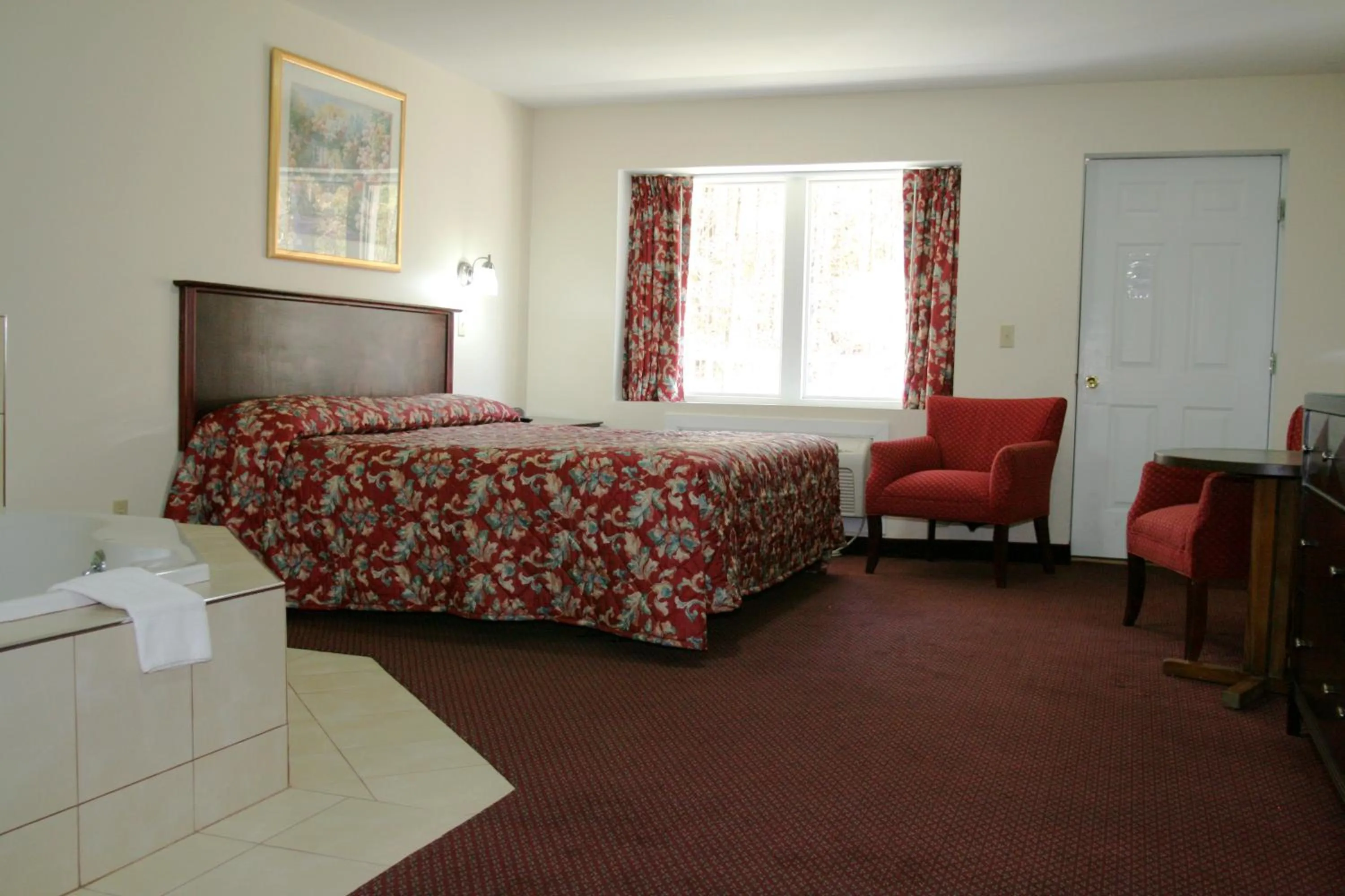 Bed in Studio Motel of Lake George