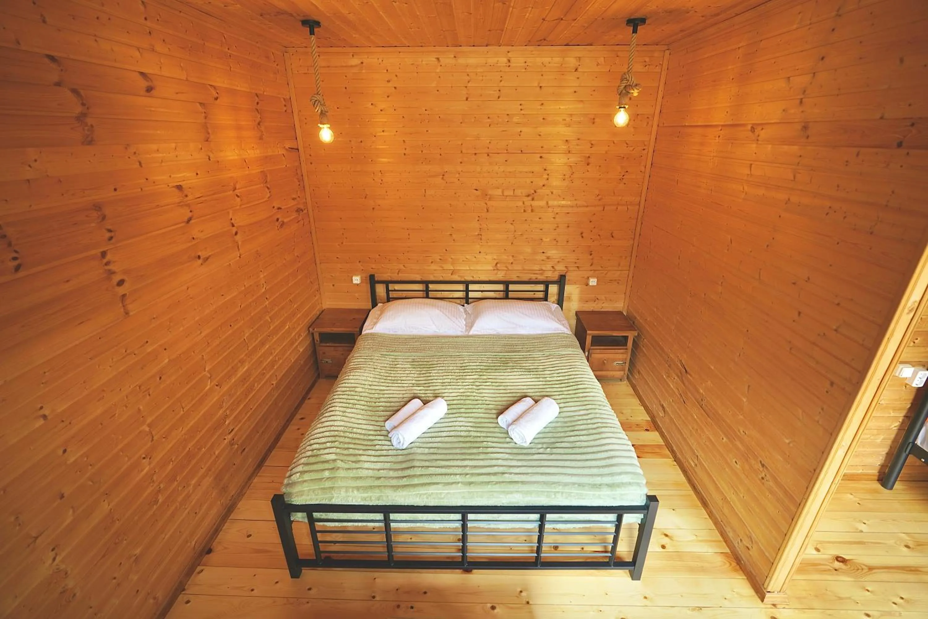 Bed in Mountain Cabins