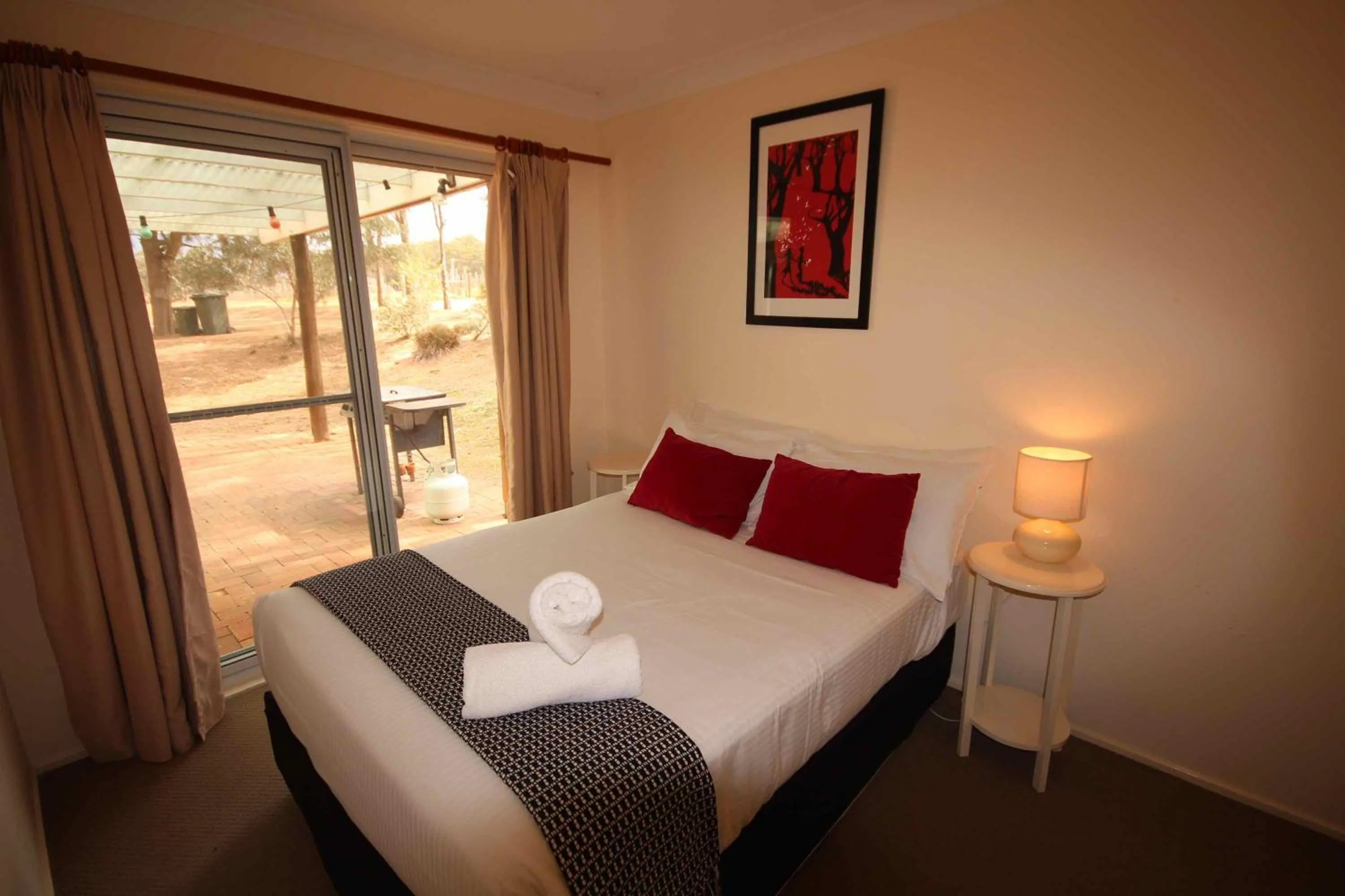 Bed in Verona Vineyard Cottage
