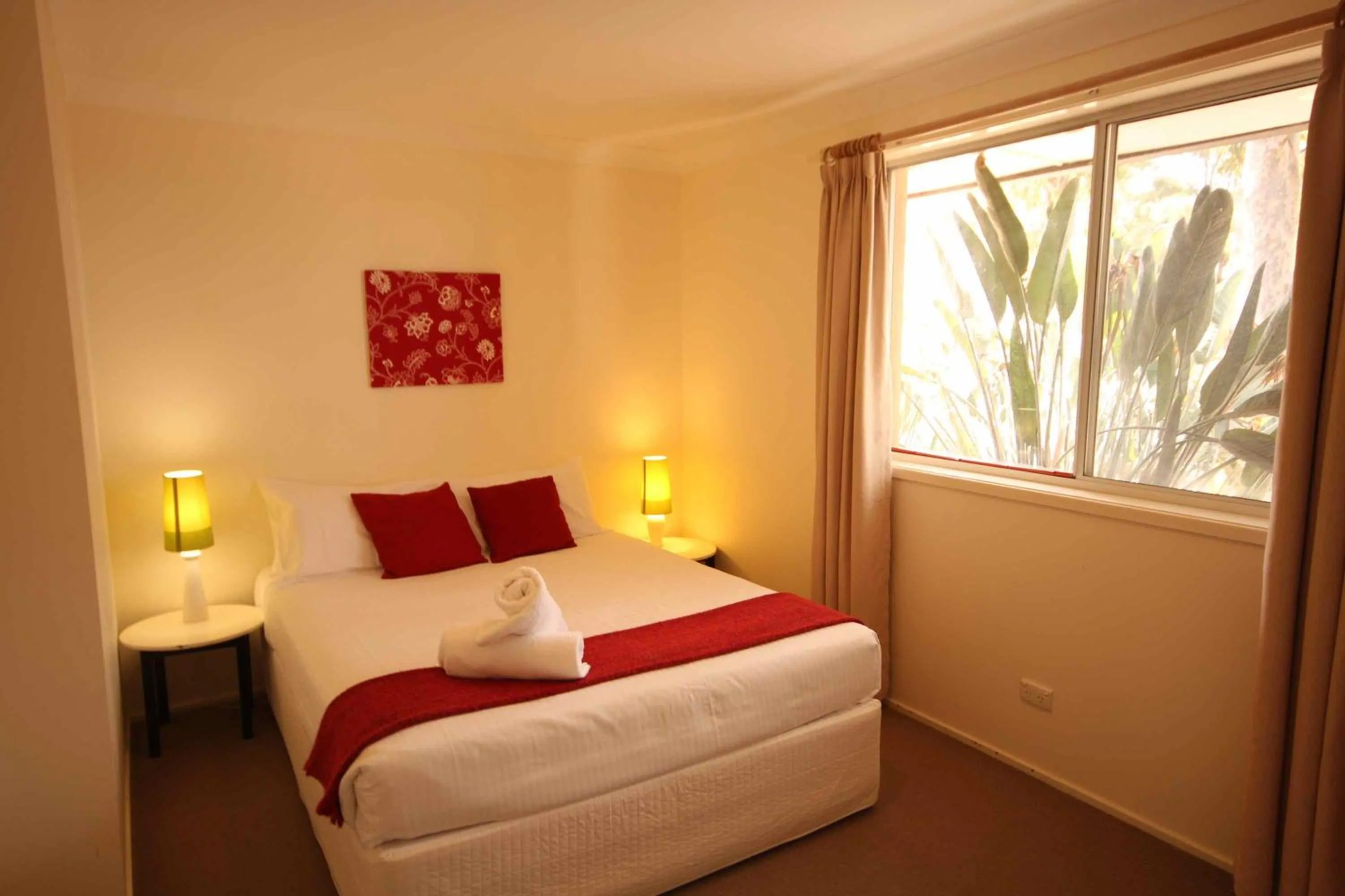 Bed in Verona Vineyard Cottage