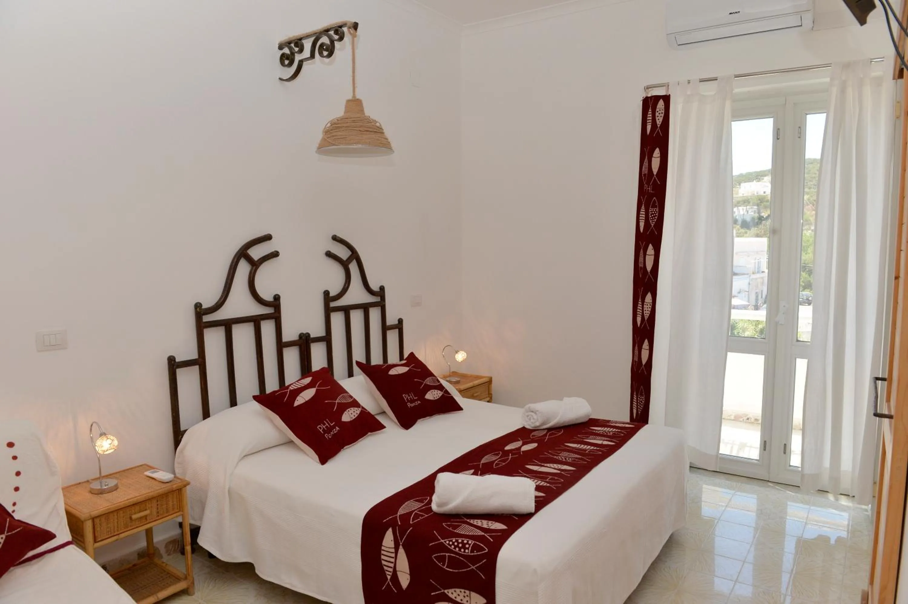 Bed in Piccolo Hotel Luisa