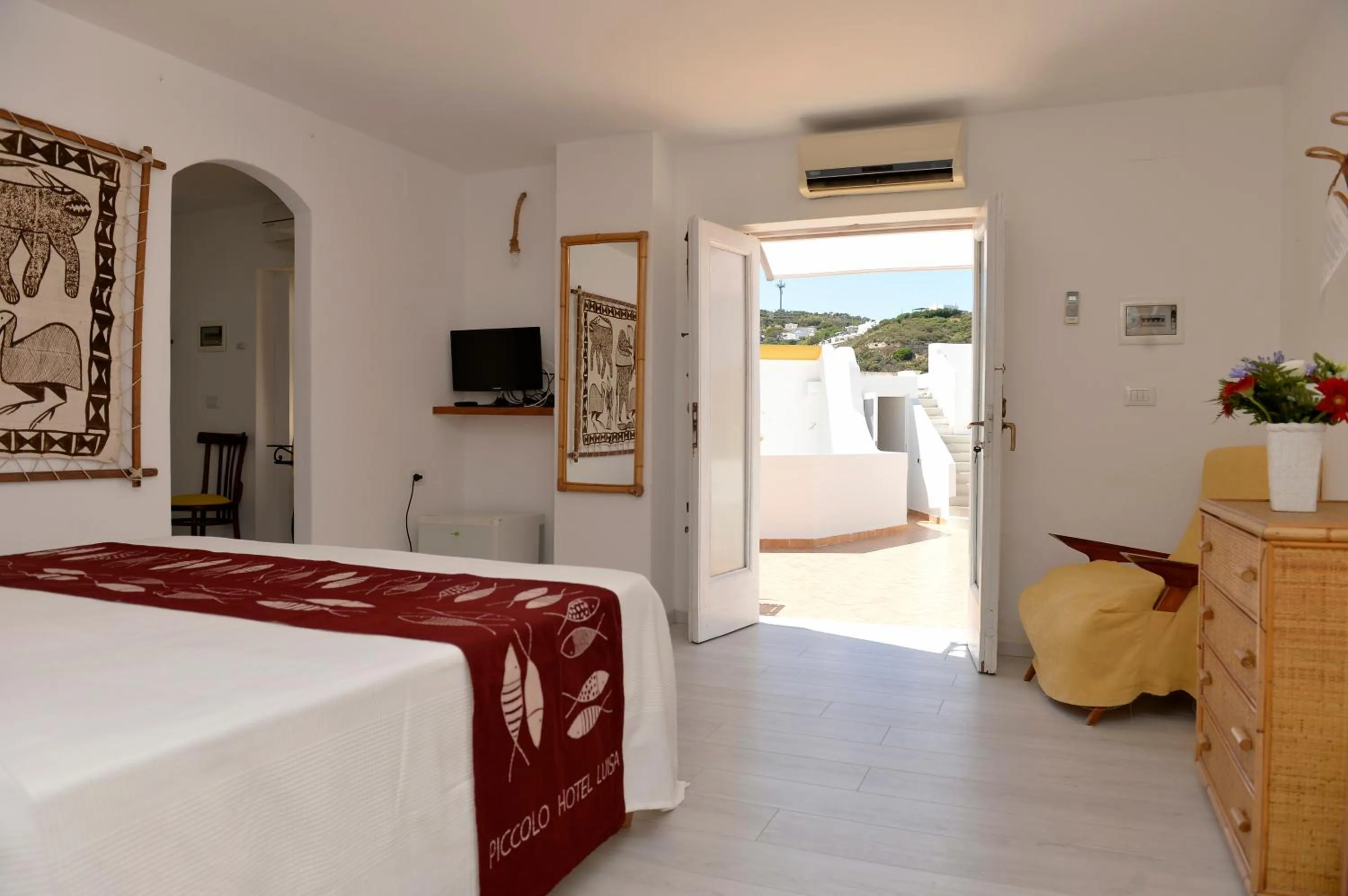 Bed in Piccolo Hotel Luisa