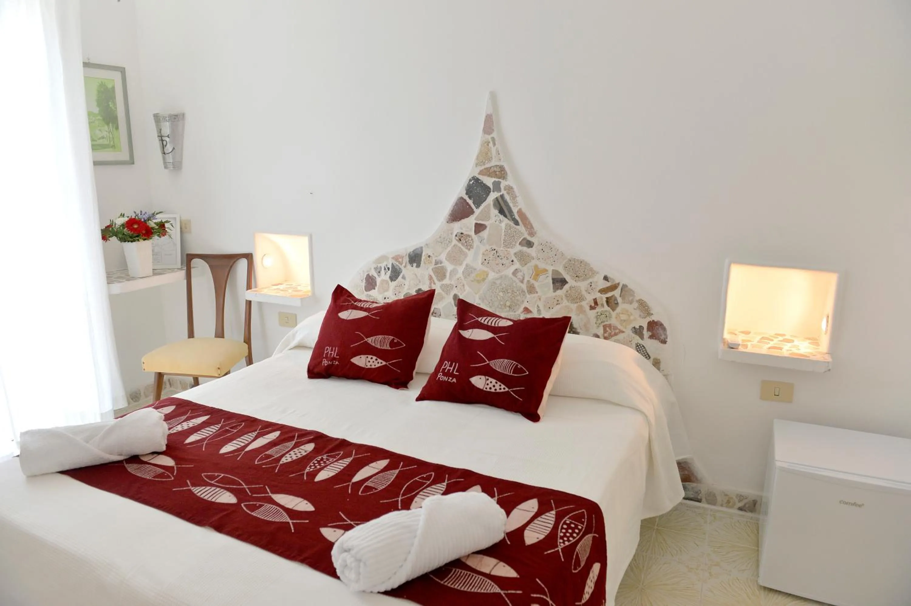 Bed in Piccolo Hotel Luisa