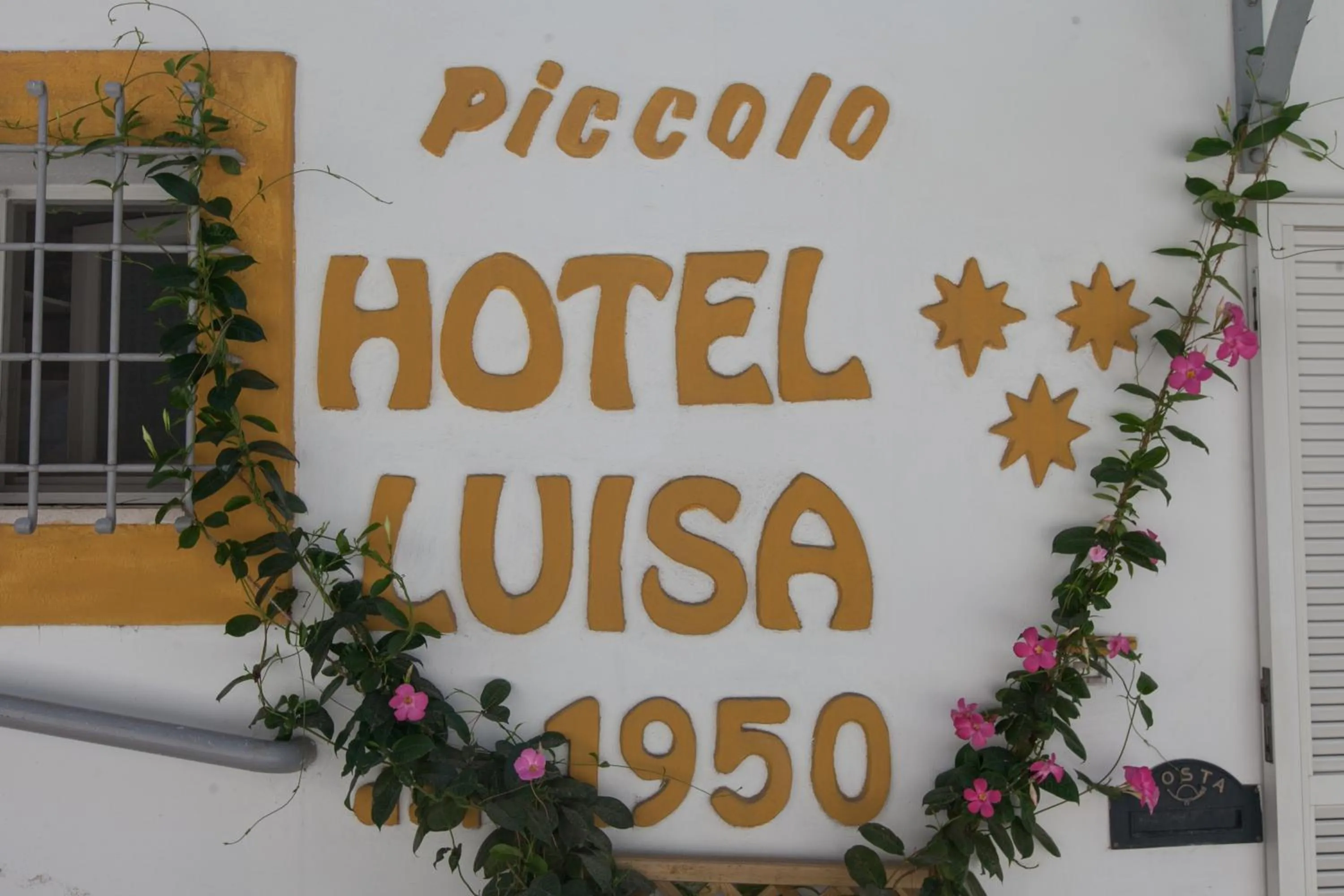 Property logo or sign in Piccolo Hotel Luisa