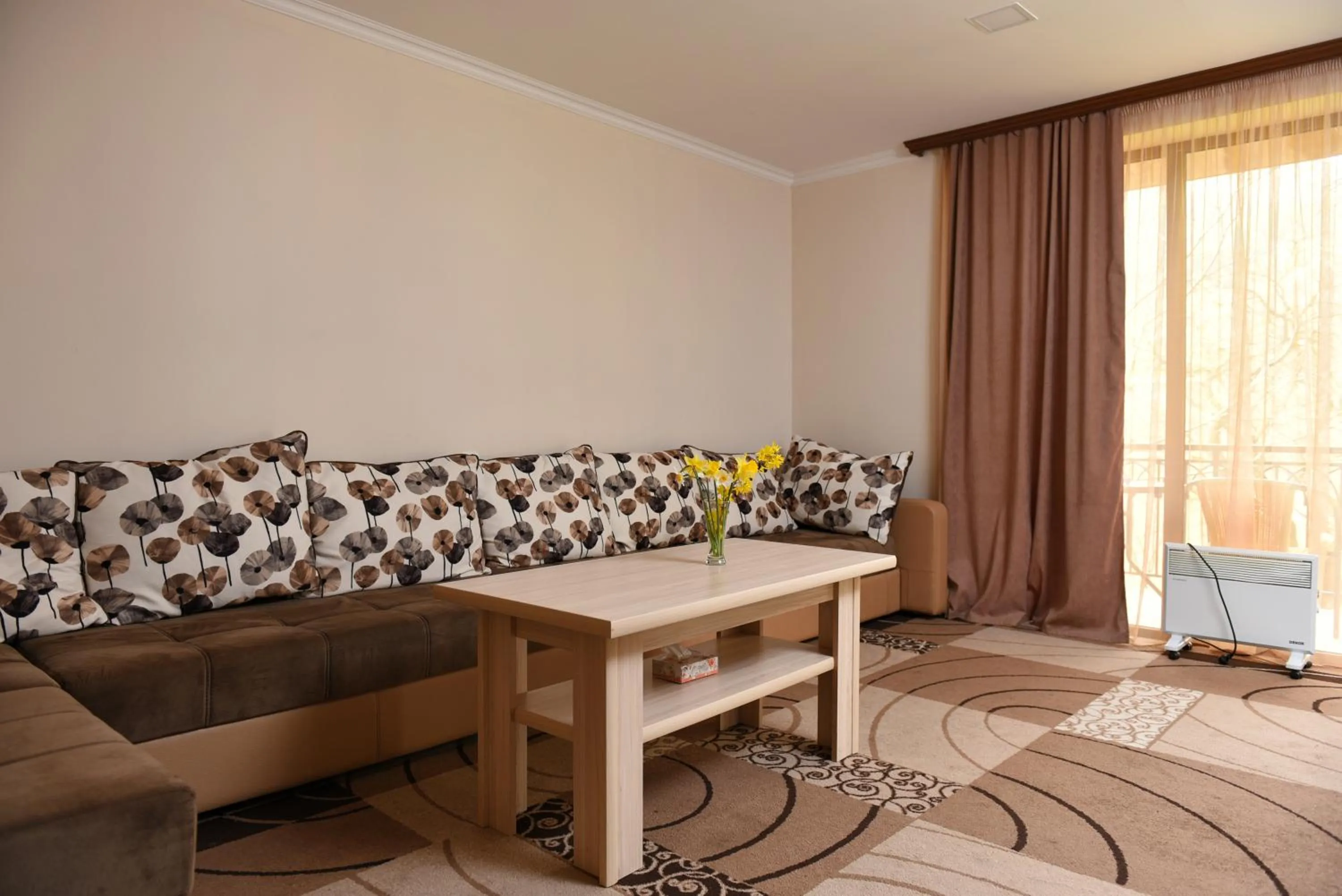 Living room in GreenWood Hotel