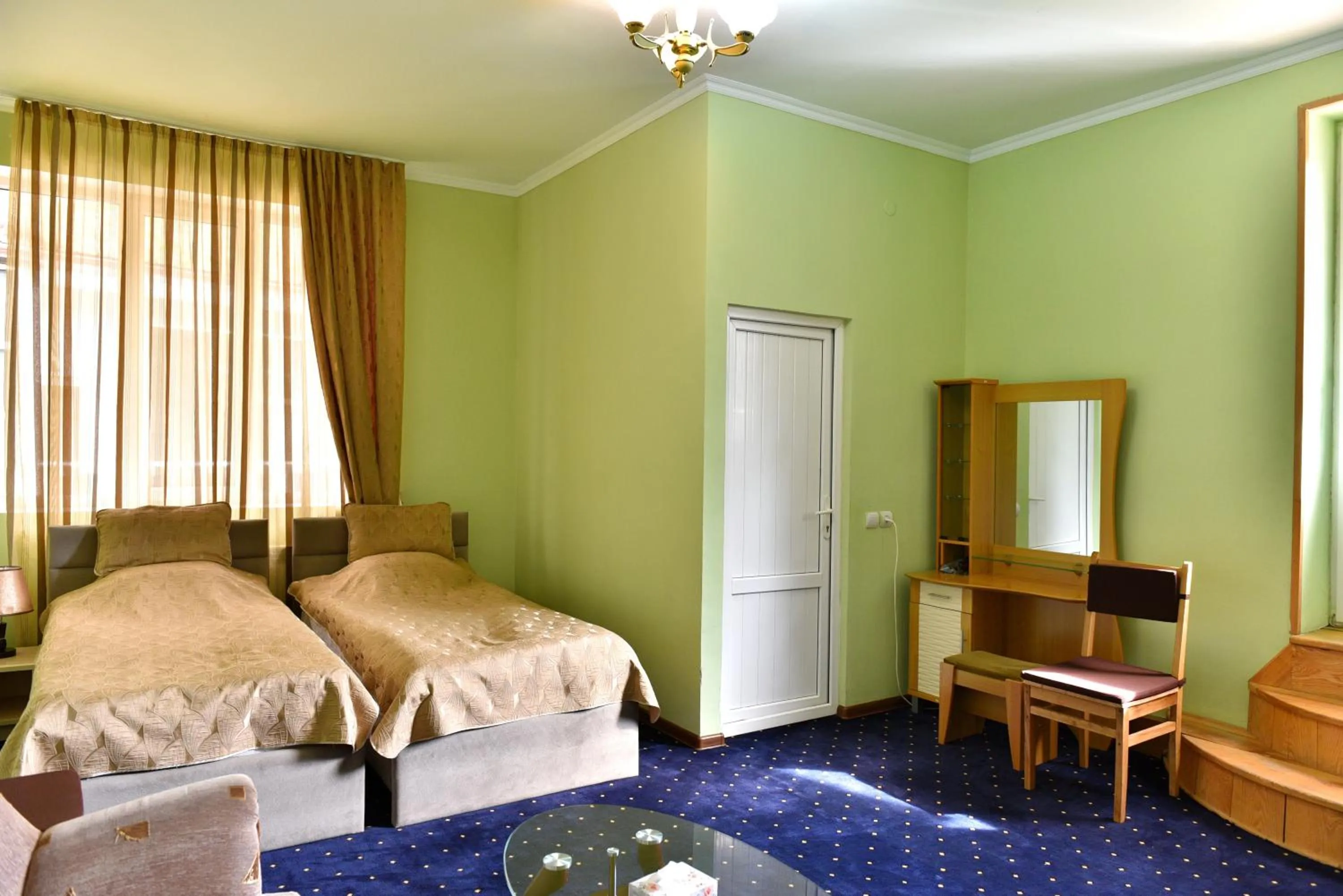 Bed in GreenWood Hotel