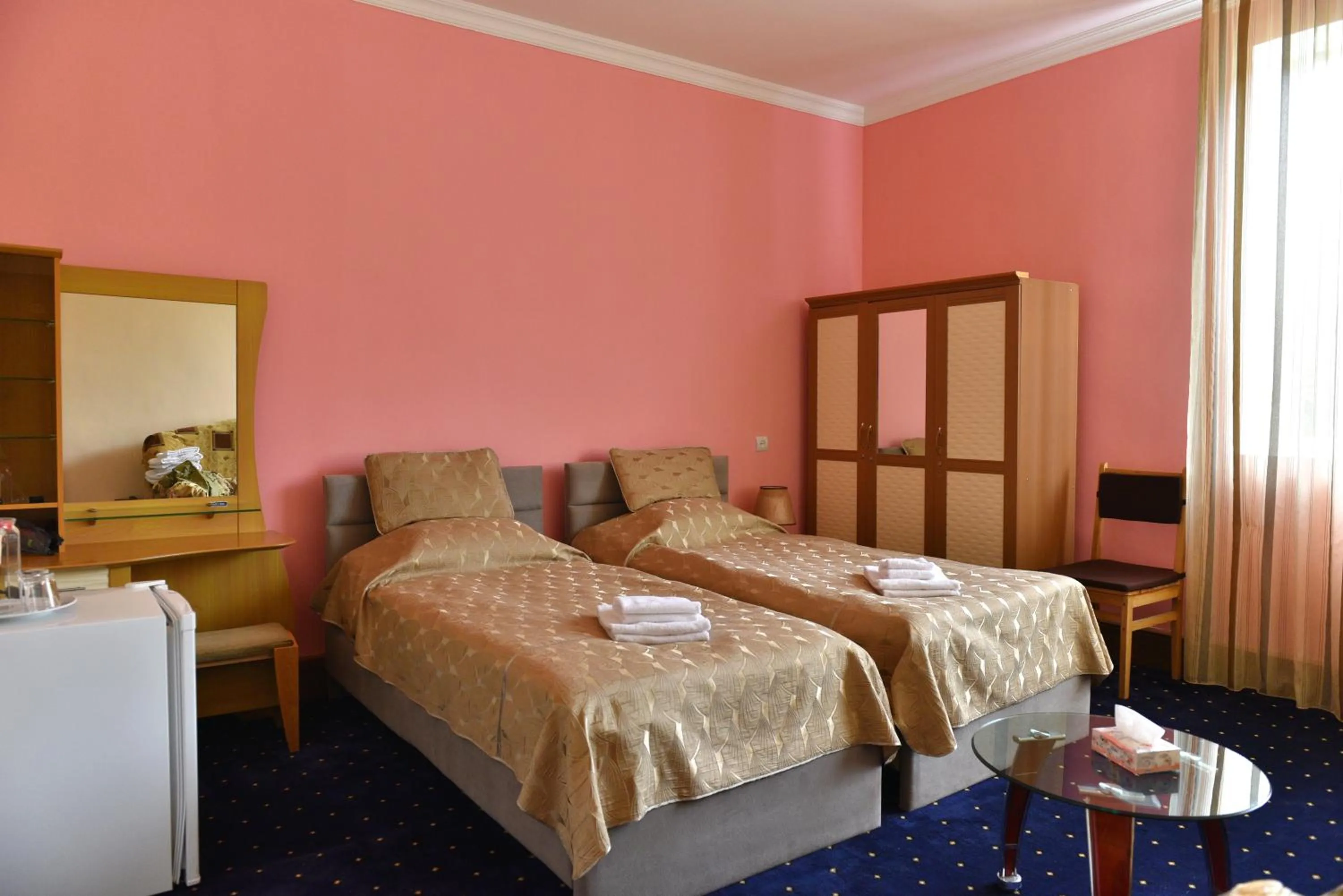 Bed in GreenWood Hotel