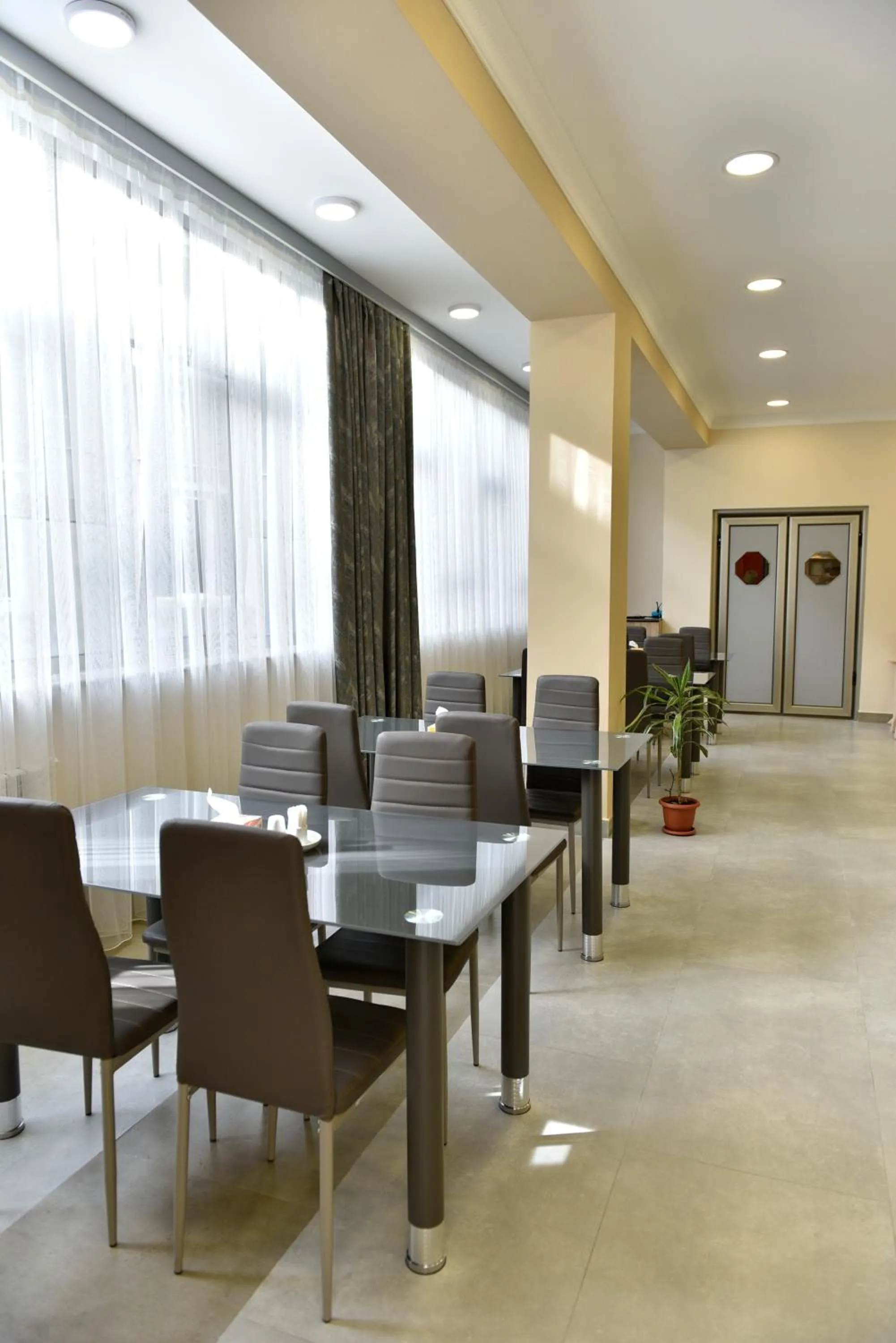 Dining area in GreenWood Hotel