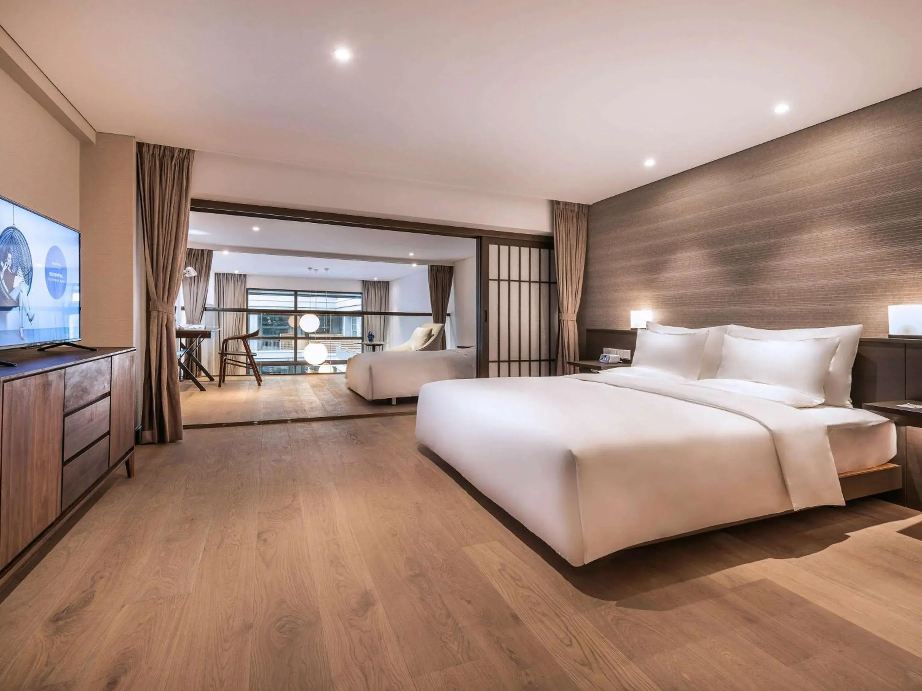 Photo of the whole room, Bed in Novotel Suites Shanghai Hongqiao Photo of the whole room, Bed in Novotel Suites Shanghai Hongqiao