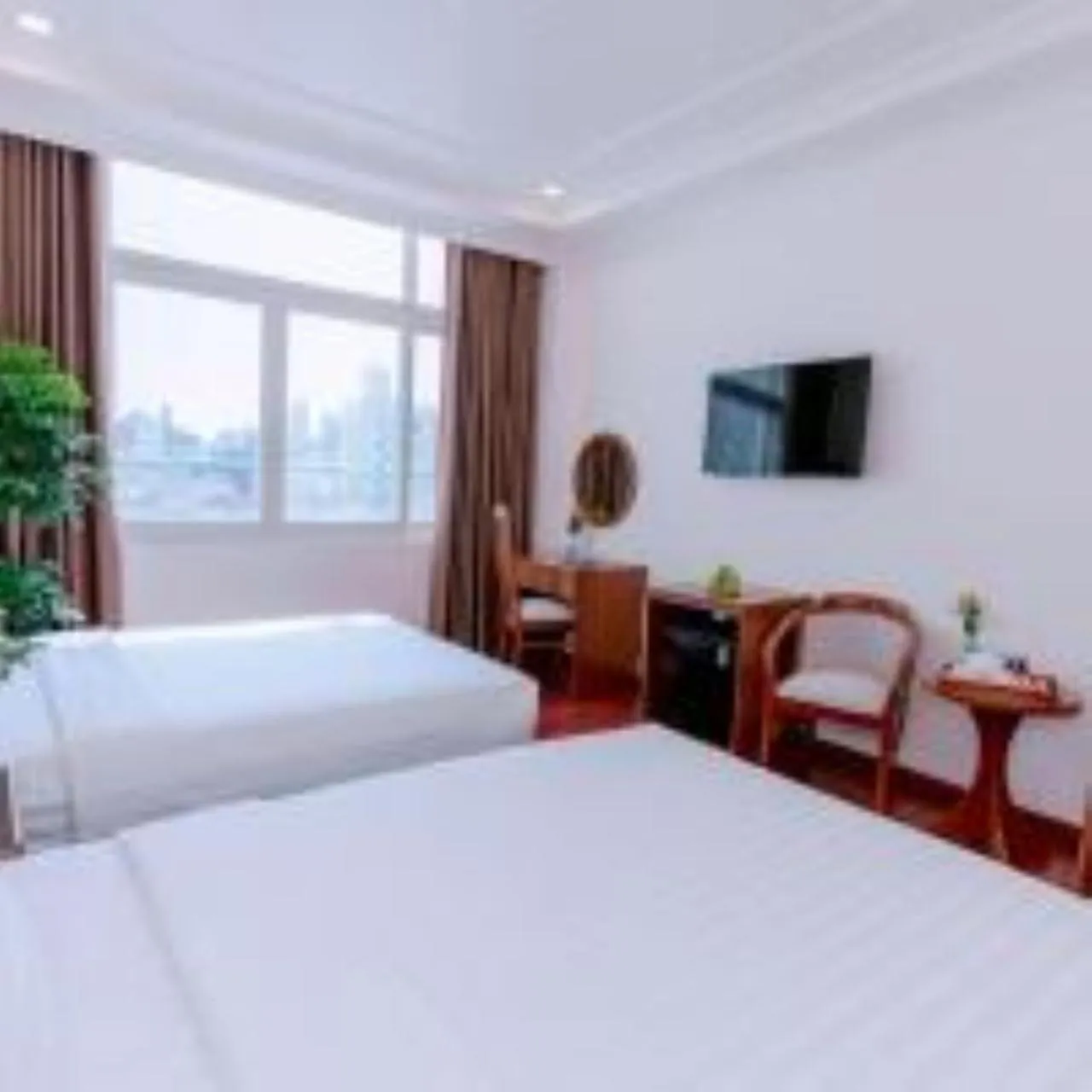 Bedroom, Bed in DAHLIALAND SAIGON HOTEL & SWIMMING PooL