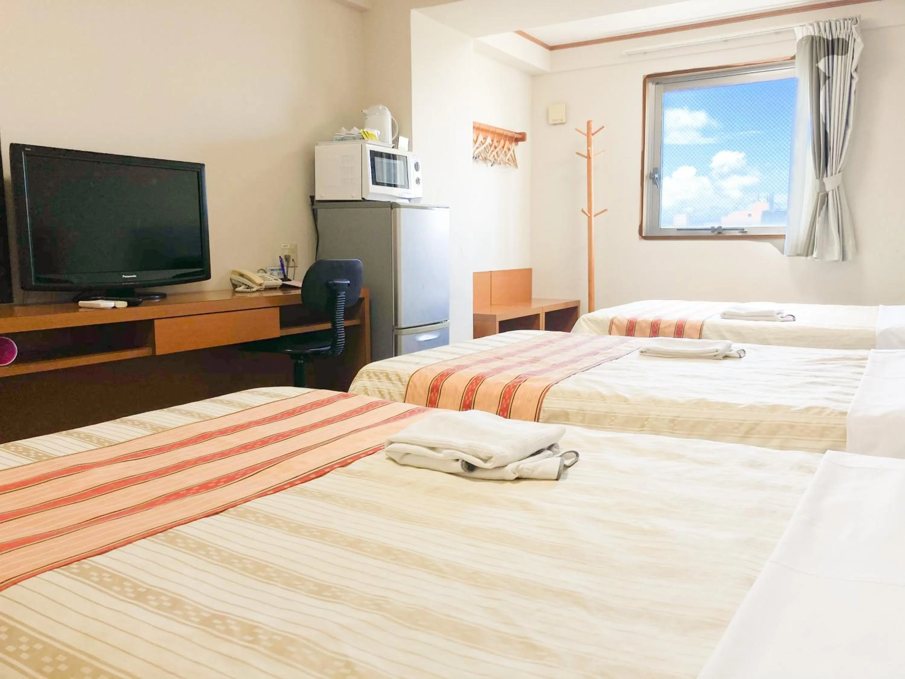 Bed in Hotel Peace Island Miyakojima