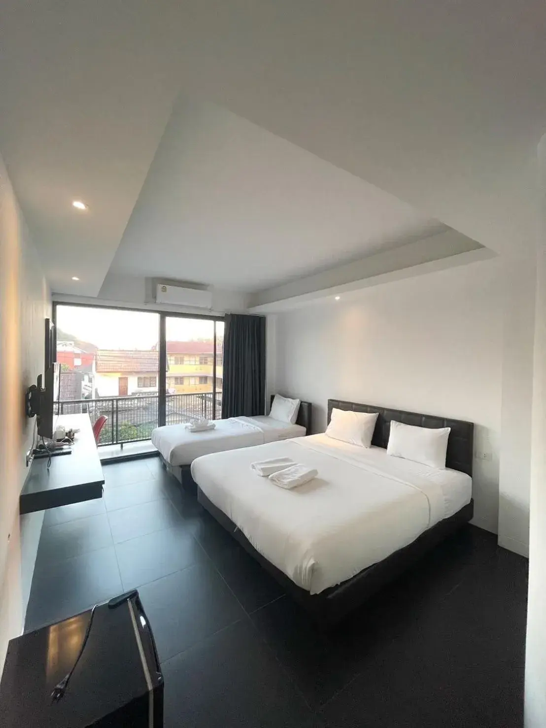 Standard Triple Room in Azz Hotel Standard Triple Room in Azz Hotel