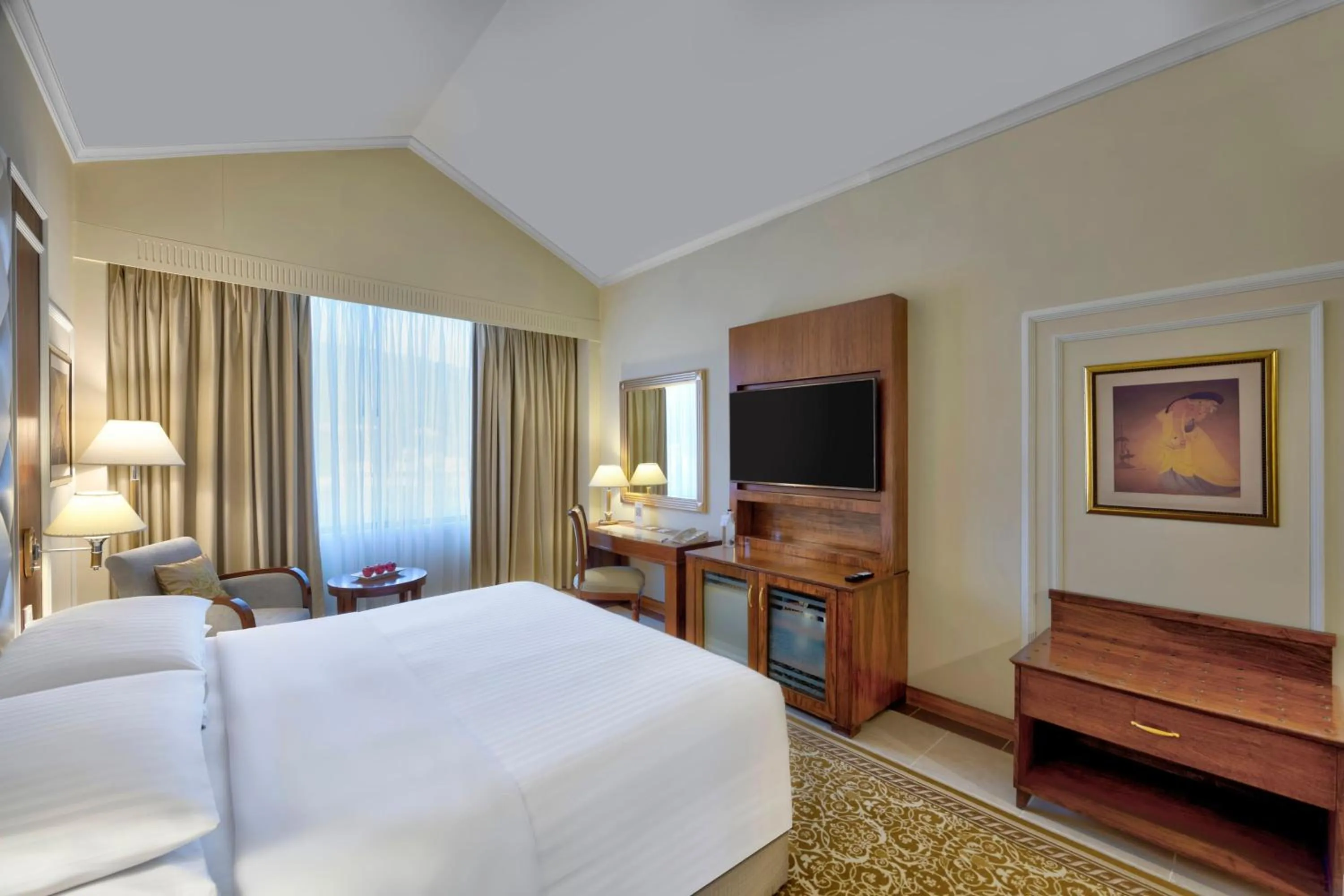 Photo of the whole room, Bed in Islamabad Marriott Hotel