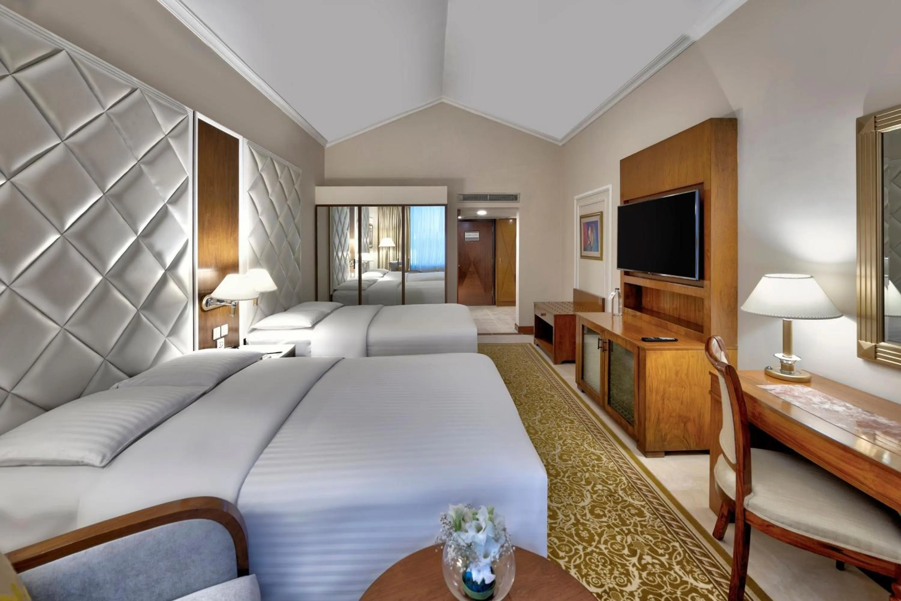 Photo of the whole room, Bed in Islamabad Marriott Hotel