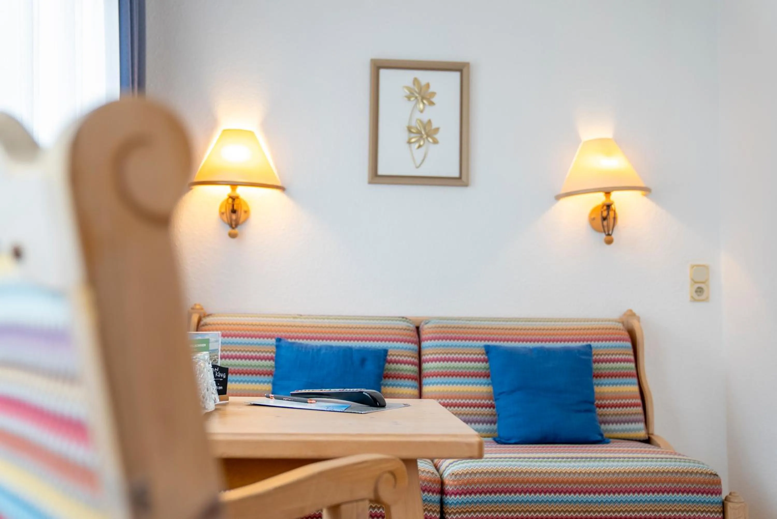 Living room, Bed in Hotel Krug