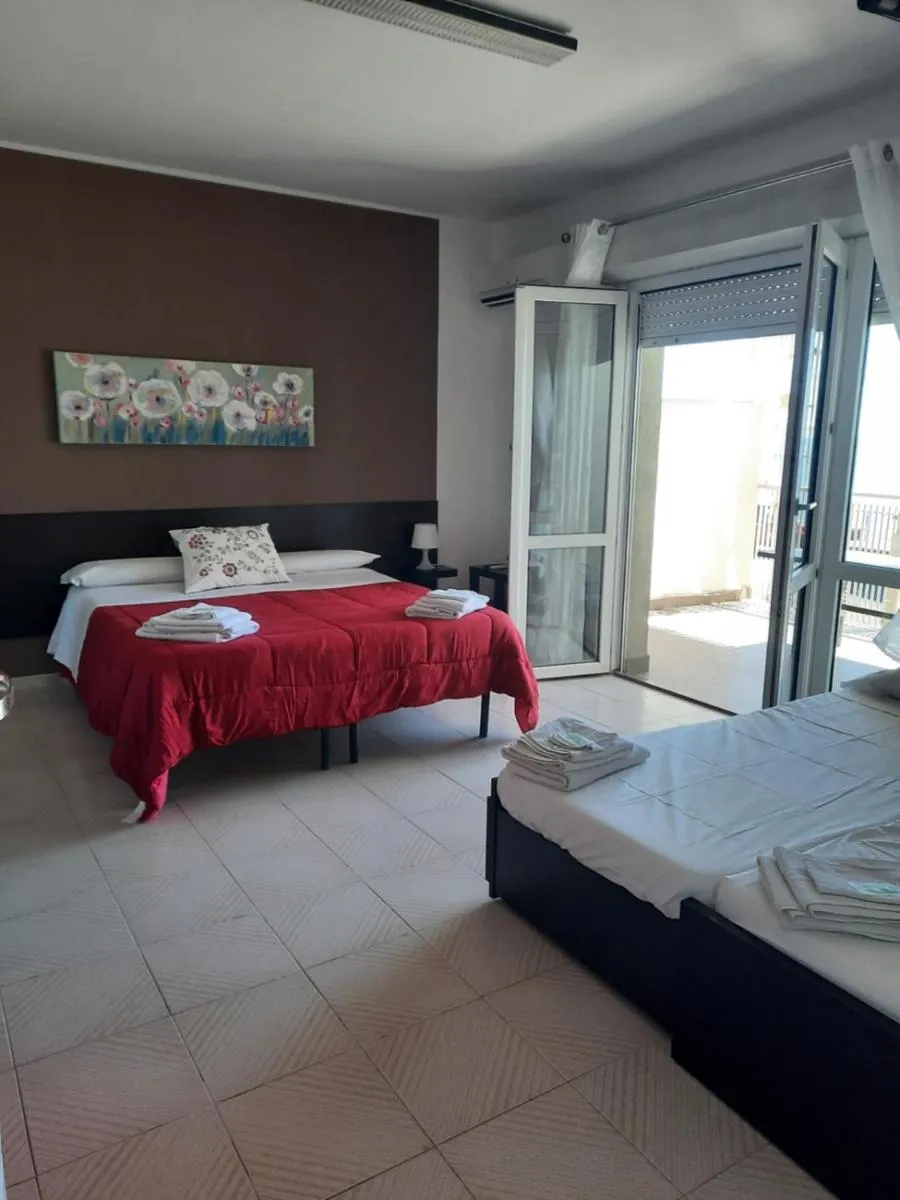 Bed in Marina D'Agrò Residence