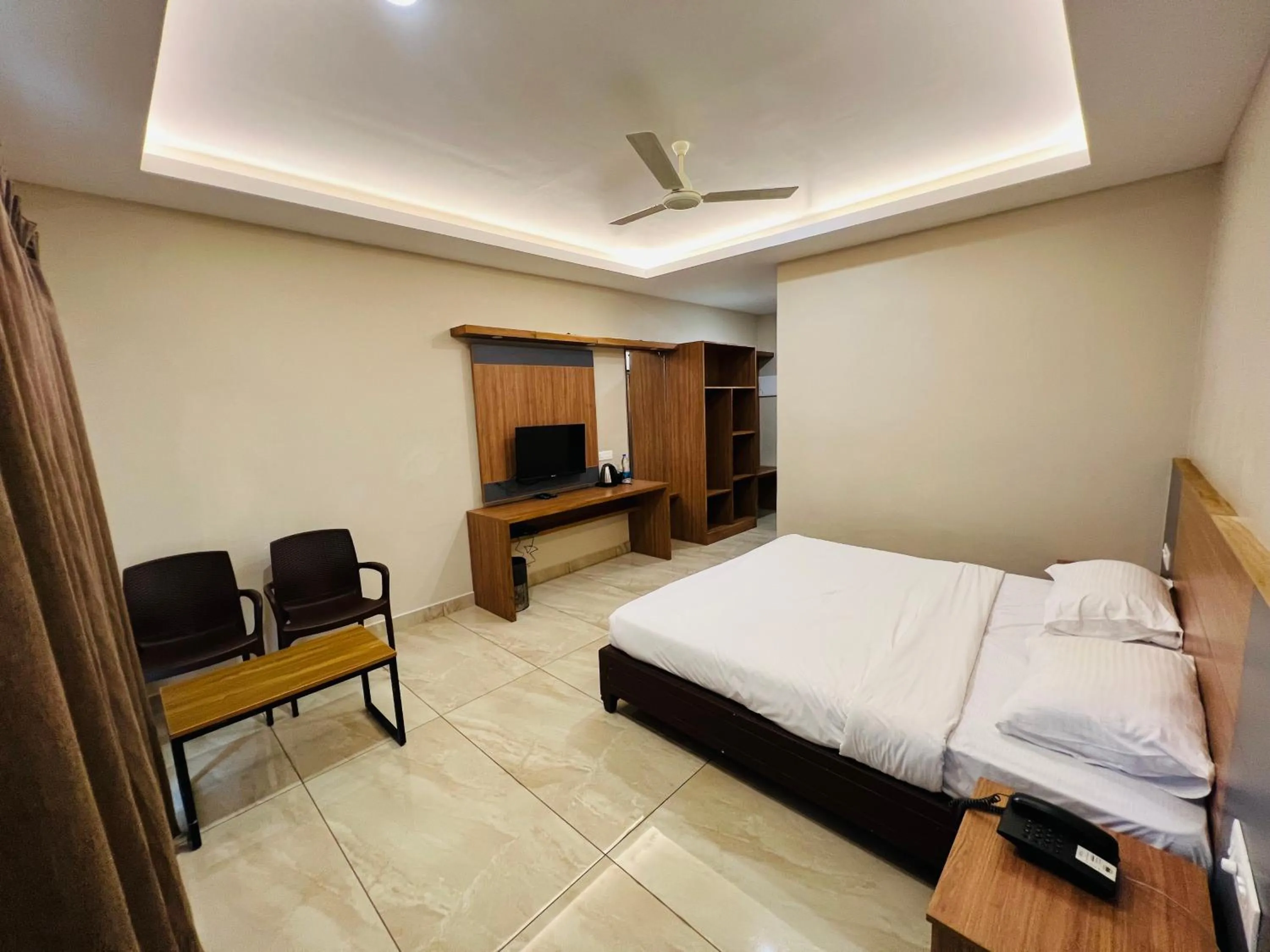 Bed in Ayur County Resort
